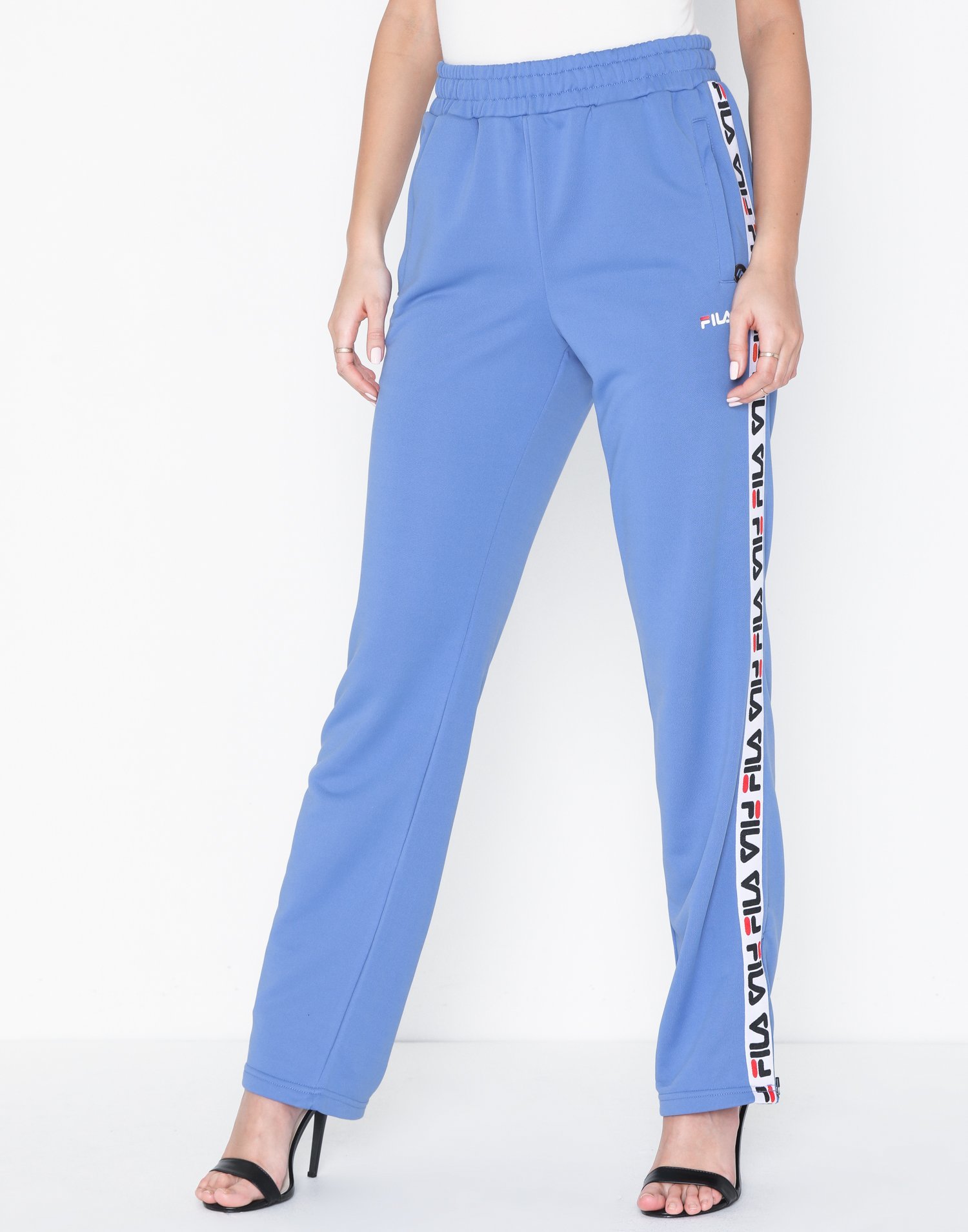 thora track pants fila