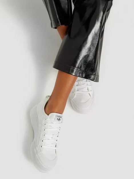 adidas Originals Super Sleek sneakers in white
