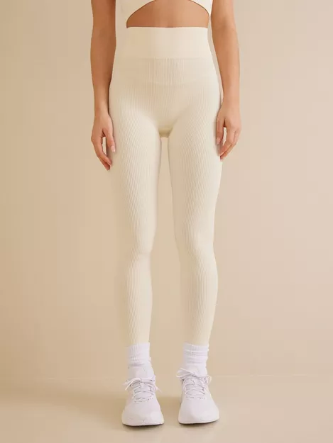 PUMA Infuse EvoKnit leggings in off white