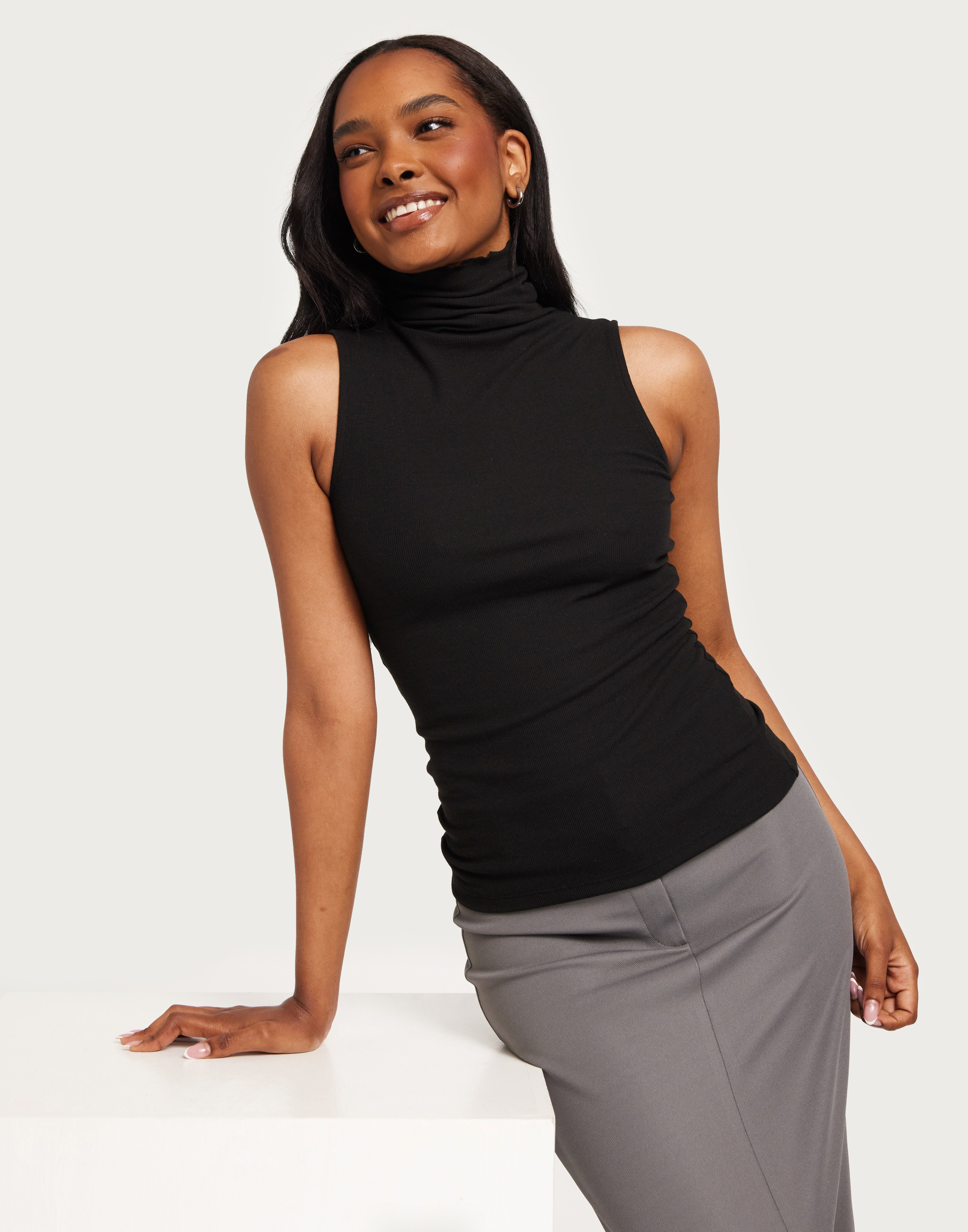 black sleeveless turtleneck