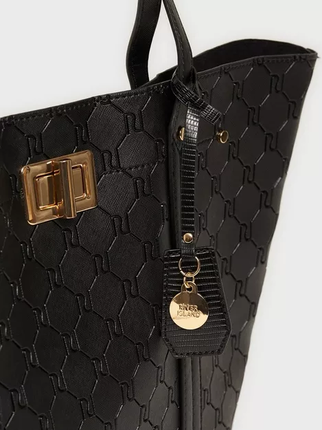 River Island embossed print charm detail shopper bag in black