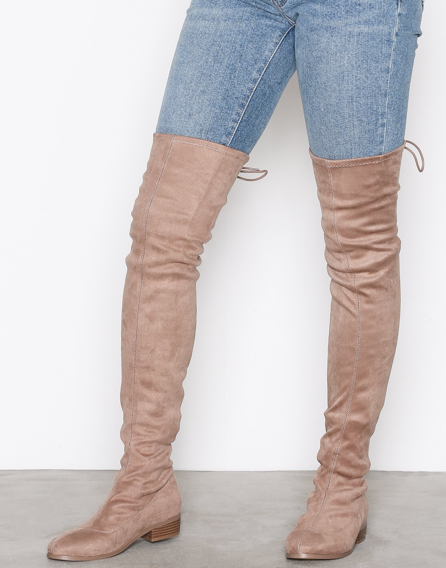 nelly thigh high boots