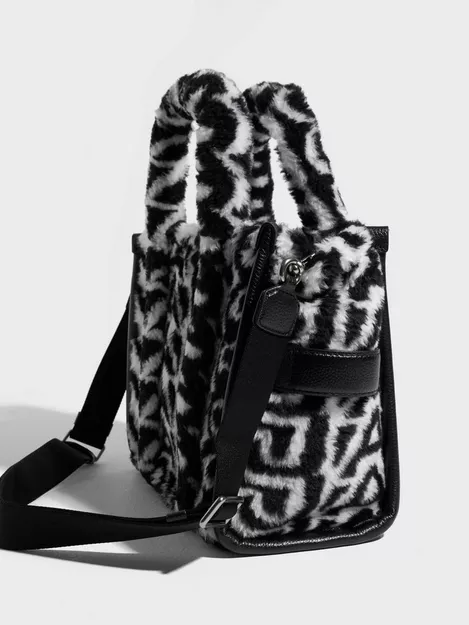 Michael Kors Voyager Small Zebra Printed Calf Hair Tote Bag (Zebra Calf  Hair) : Clothing, Shoes & Jewelry 