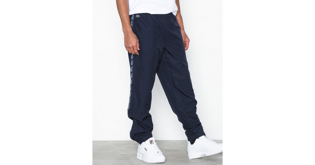 Lacoste pantalon de best sale survêtement tape guppy homme