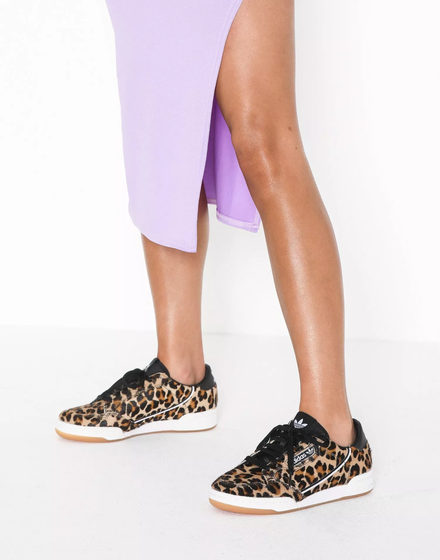 Adidas originals continental store leopard print trainers