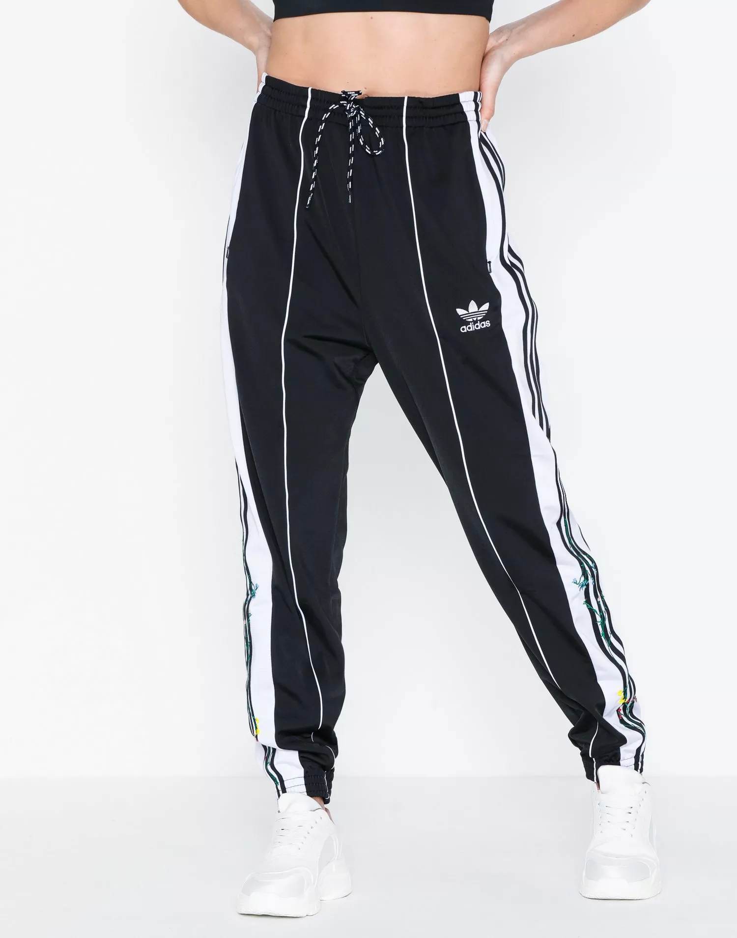 Adidas track pants outlet floral