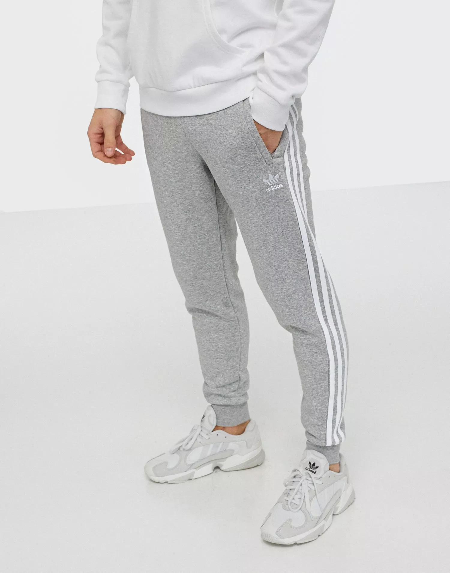 Adidas originals logo joggers in outlet grey