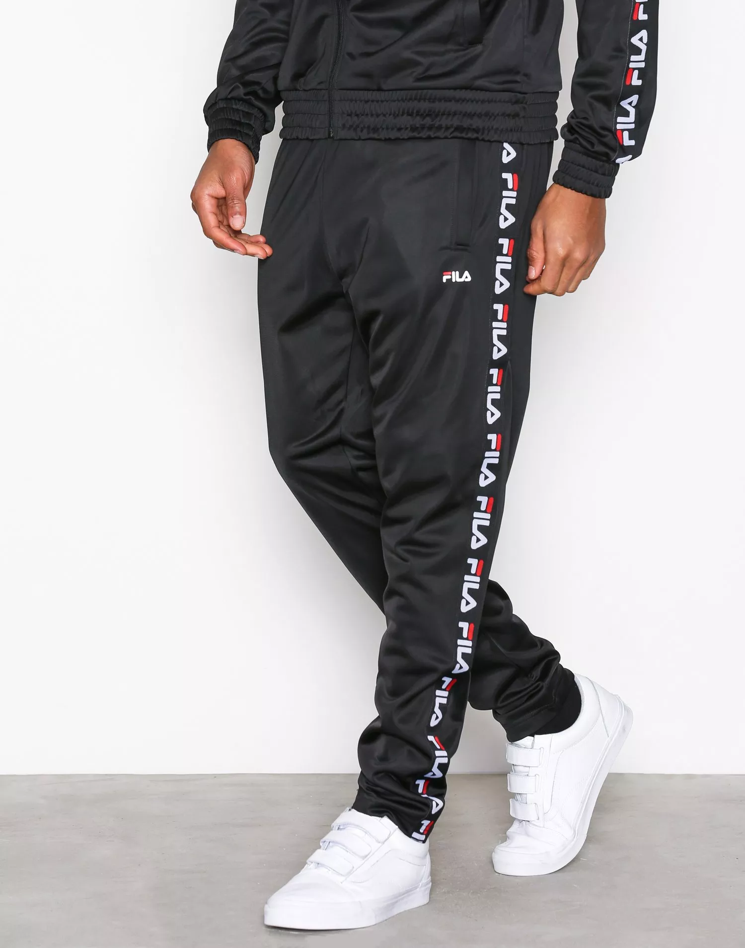 Fila tape deals track pants