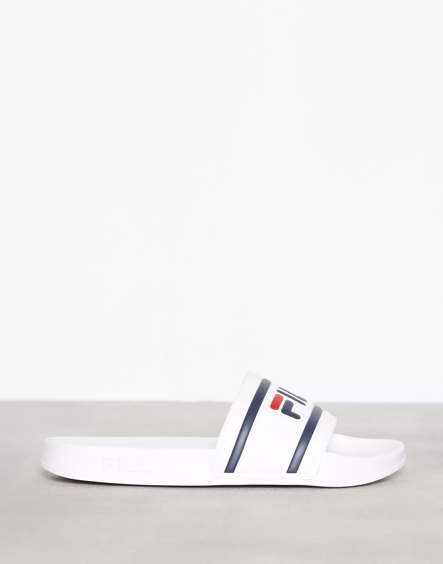 Fila slippers online white