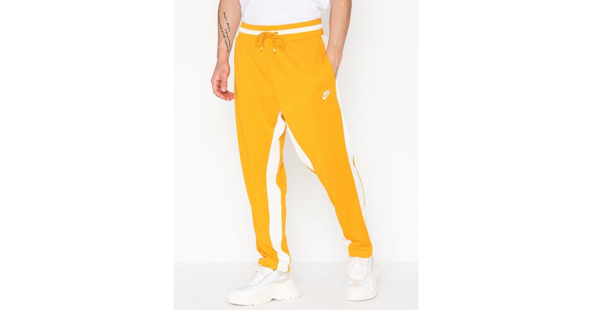 Nike nsw pants store yellow