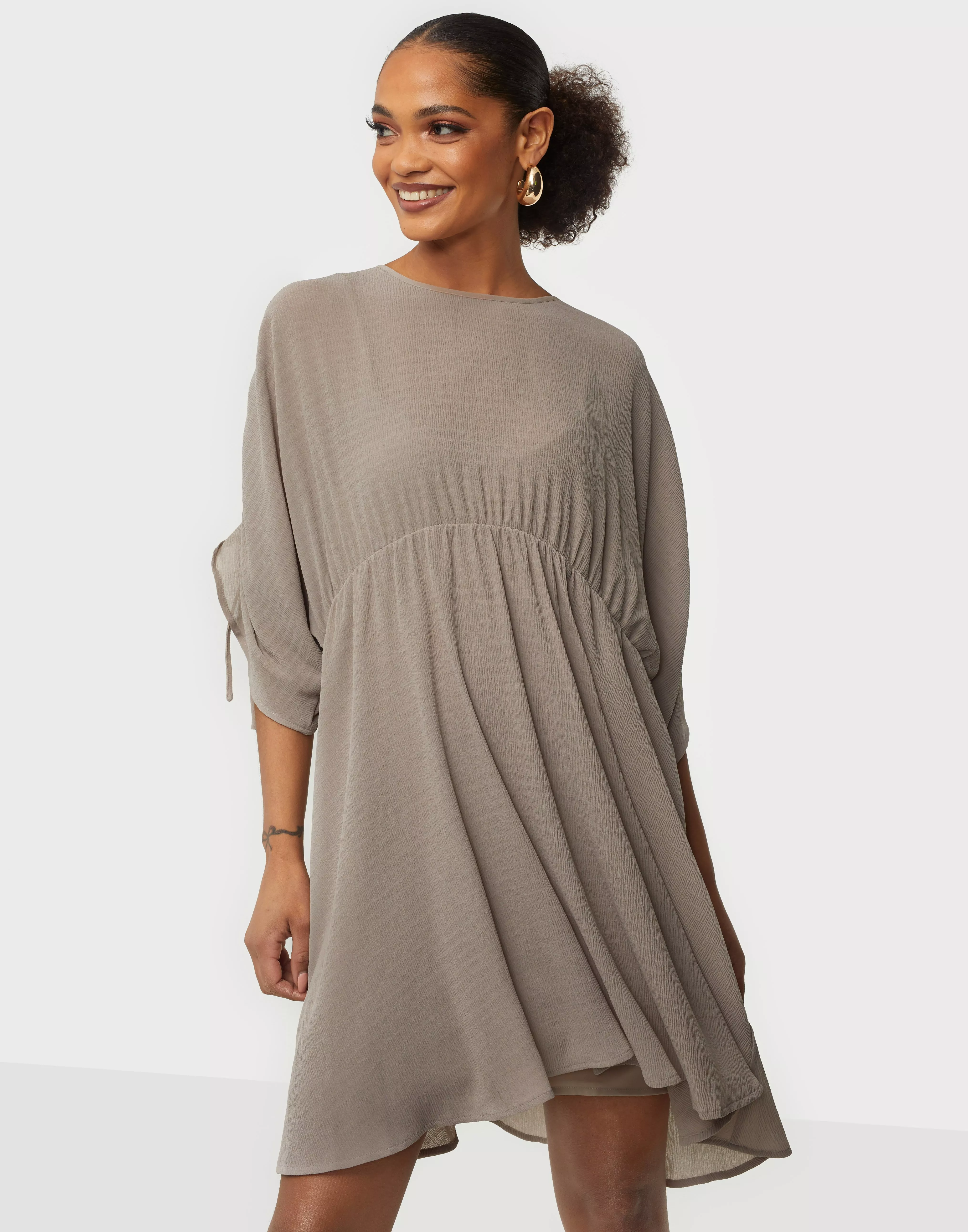 Buy Nelly Loose Dress - Beige | Nelly.com