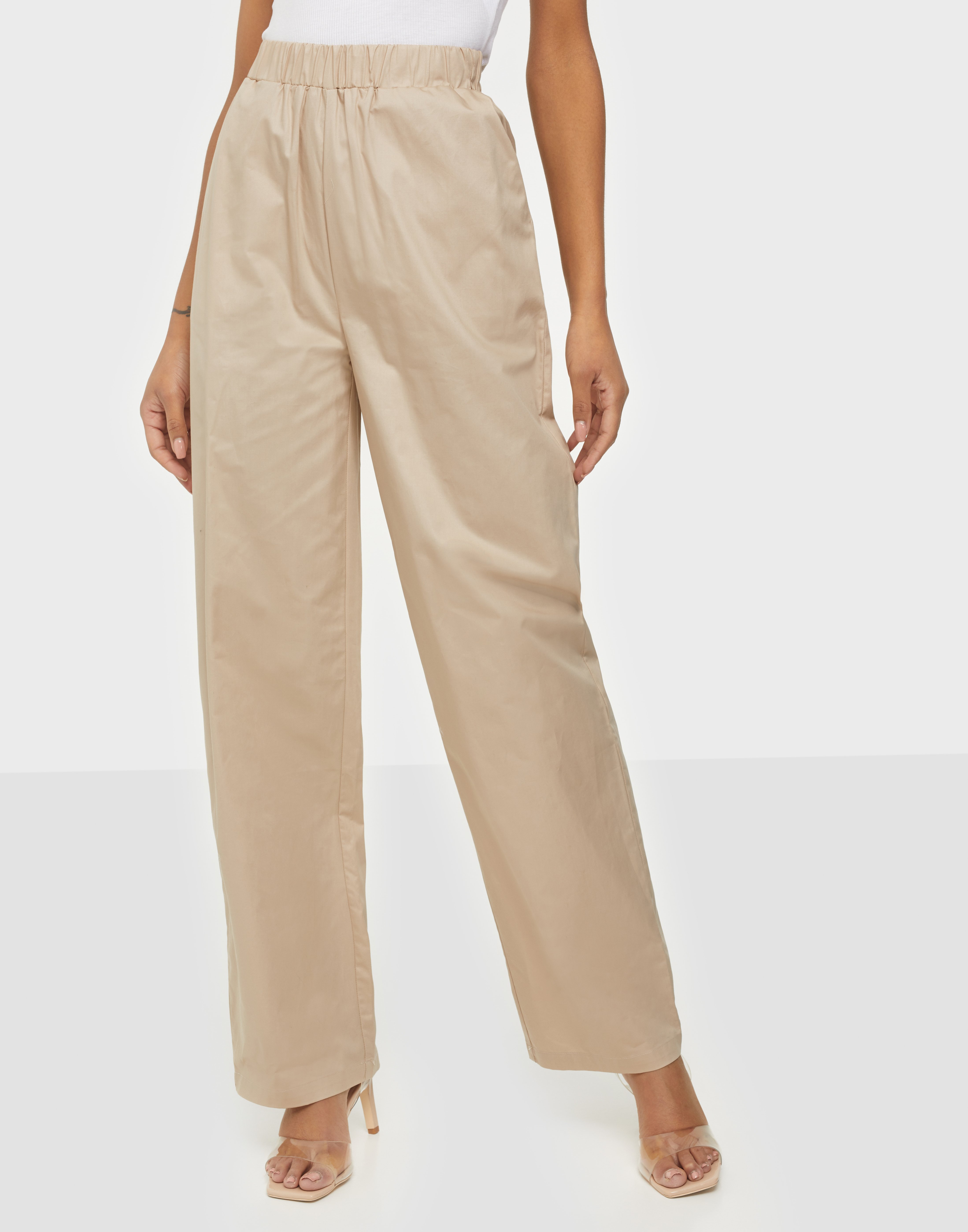 cream colored wide leg pants