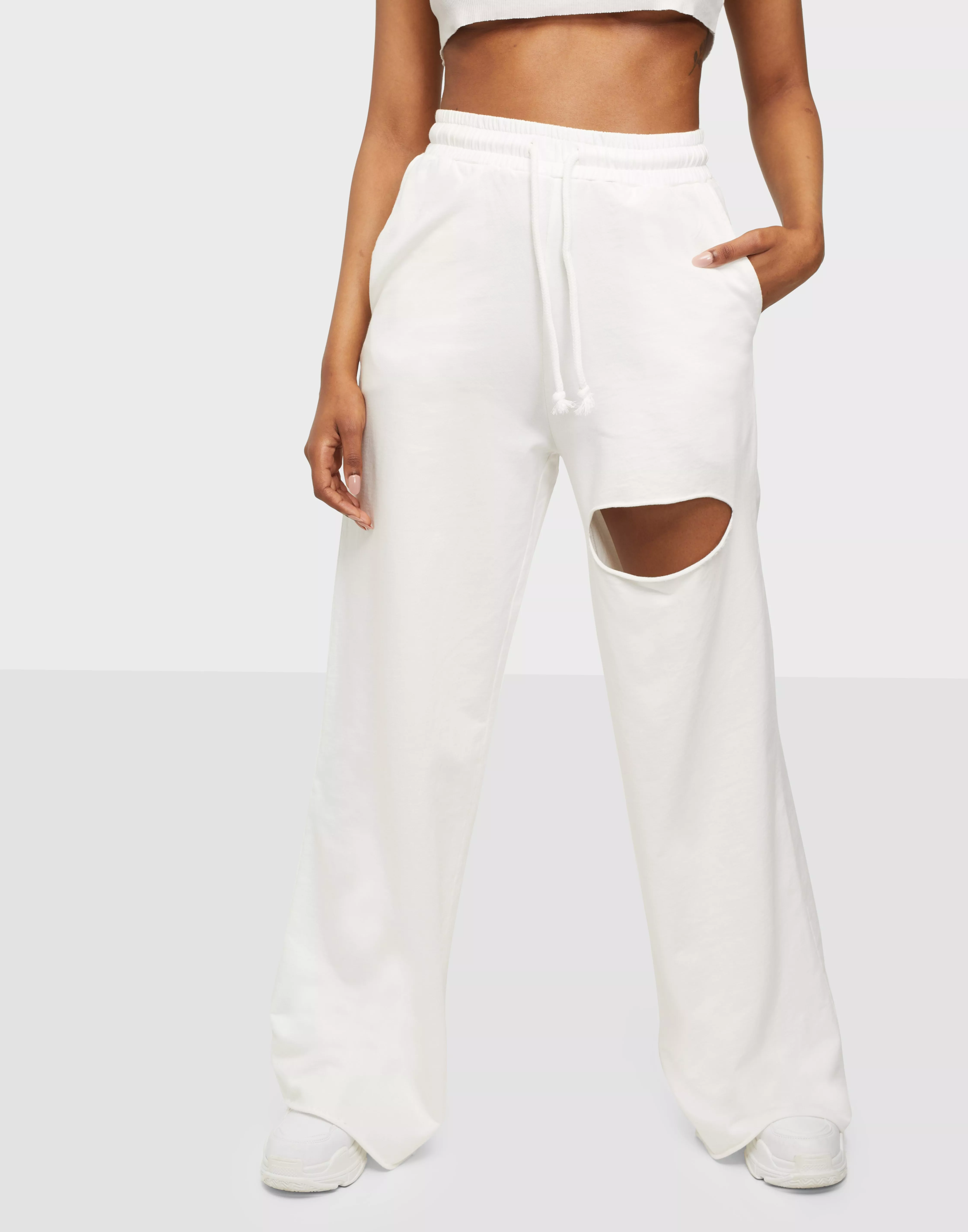 White sales ripped sweatpants