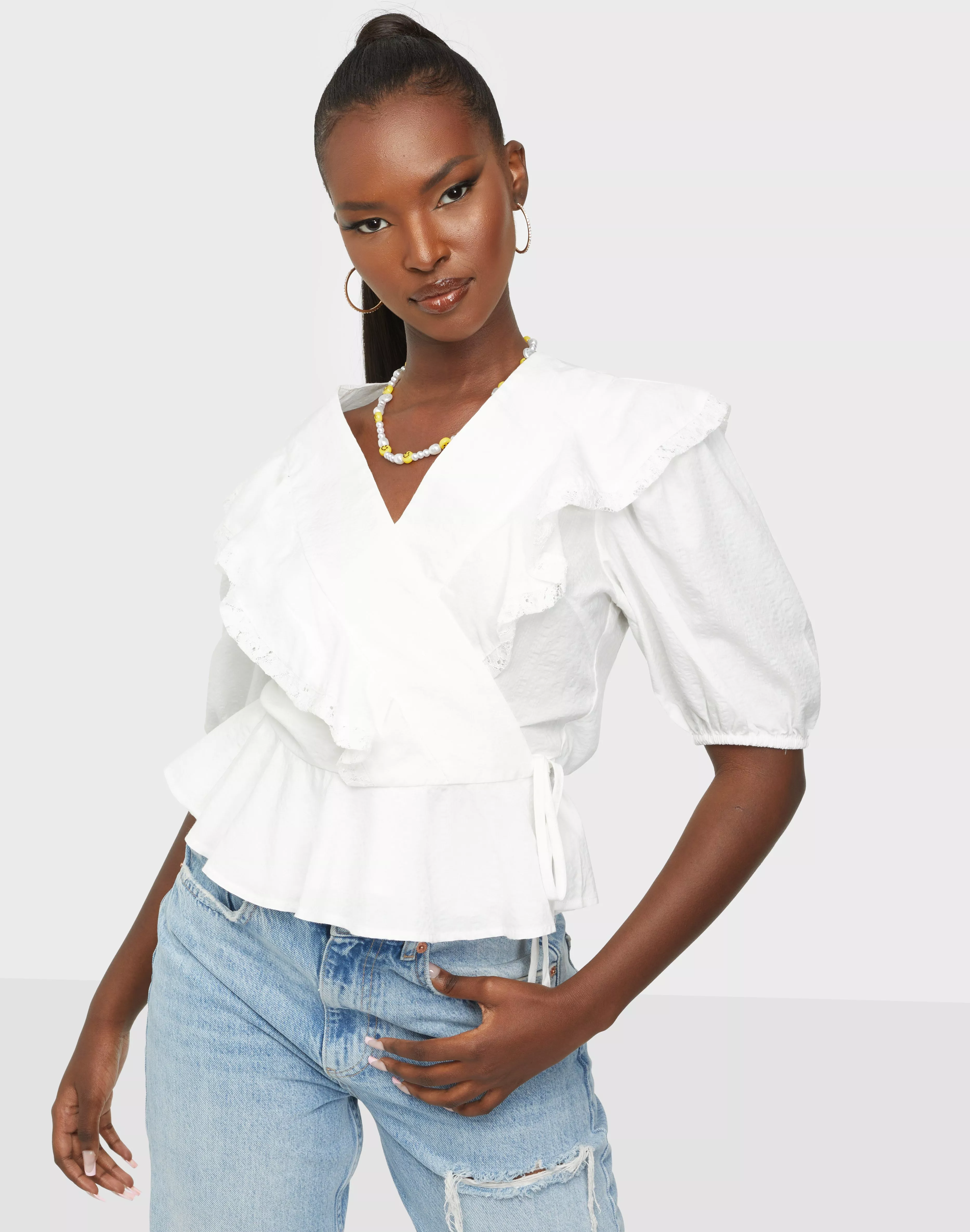 Ruffle sleeve wrap sales top