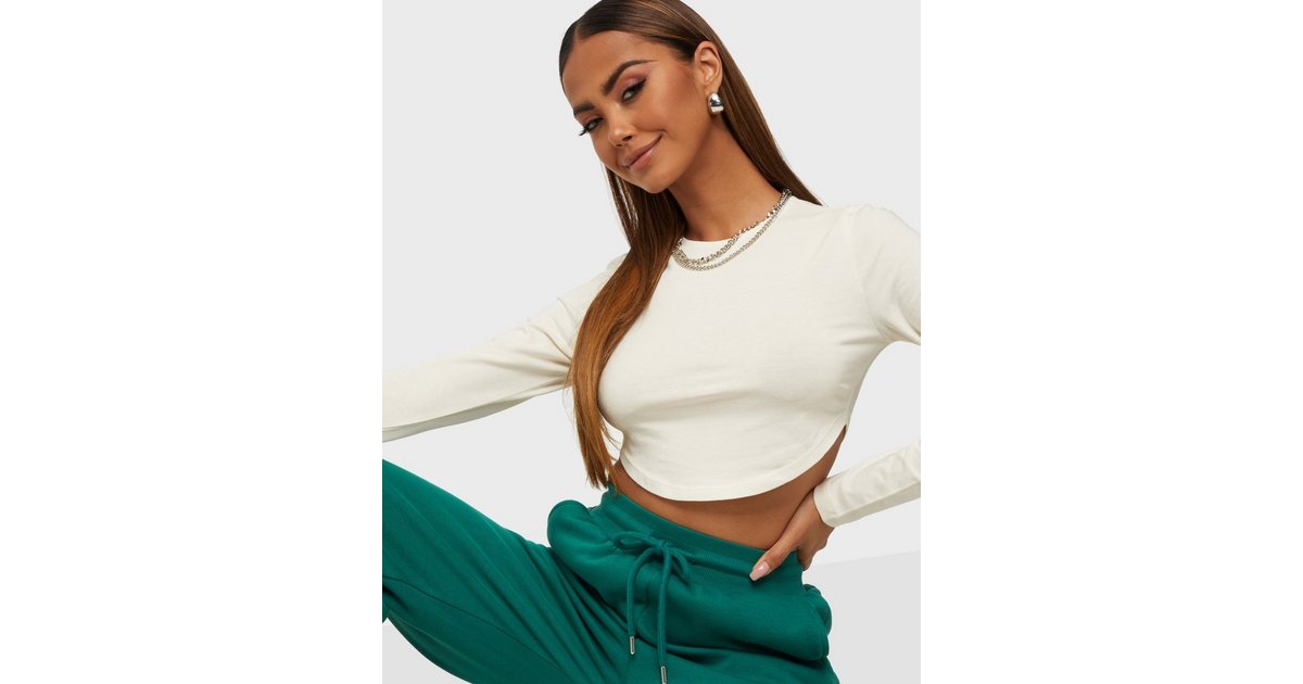Buy NLY Trend Curved Hem LS Top - White | Nelly.com