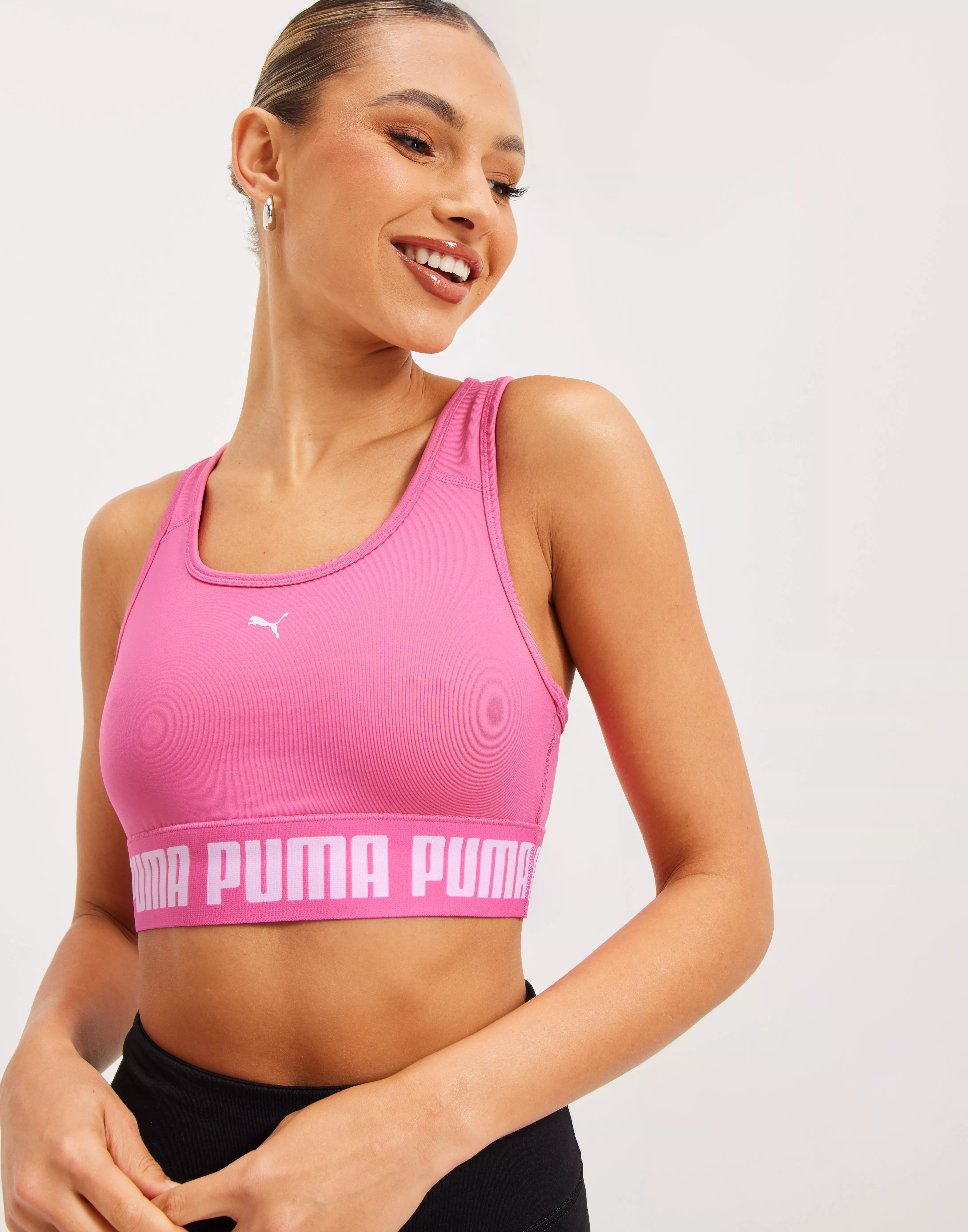 Buy Puma womens sportswear fit lightly padded sports bra pink