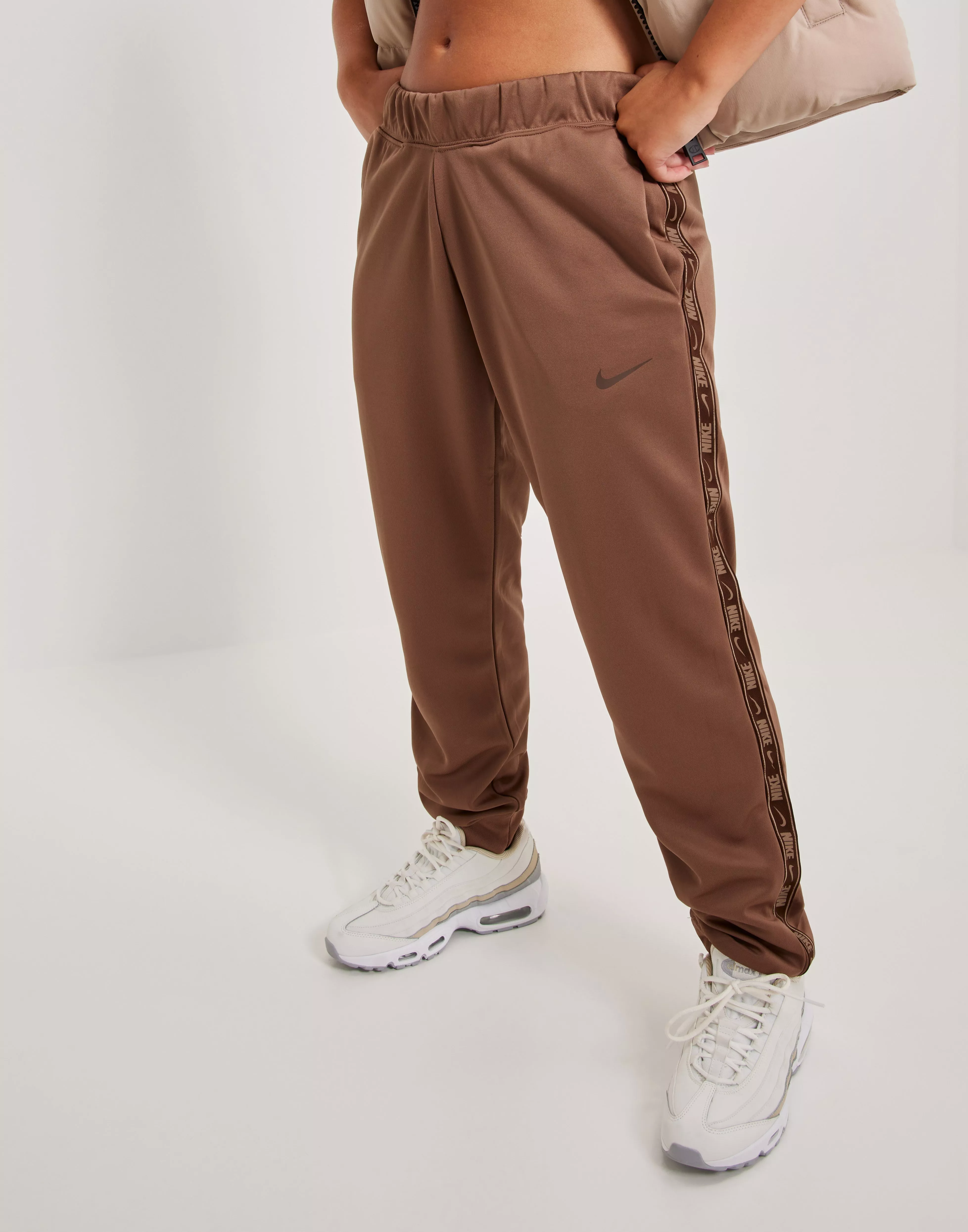 Nike w nsw pant logo tape popper best sale