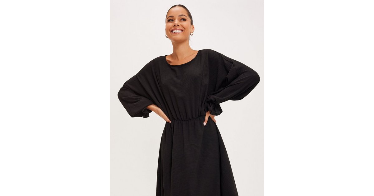 Köp Pieces PCFLORE LS O NECK DRESS Black