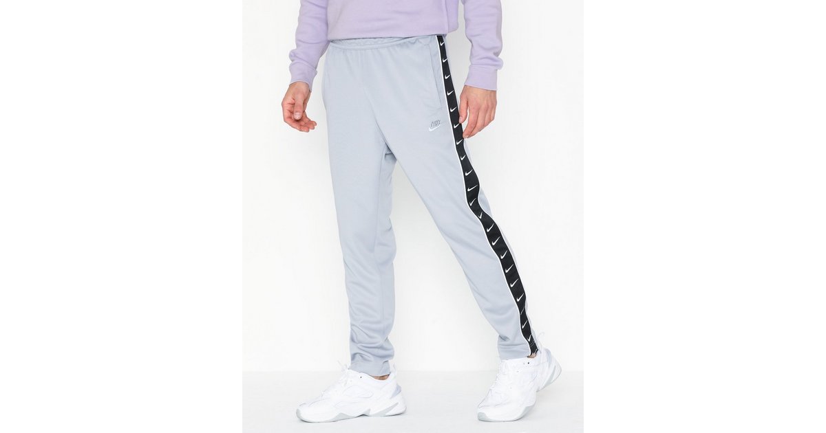 Nike hbr taped track pant new arrivals