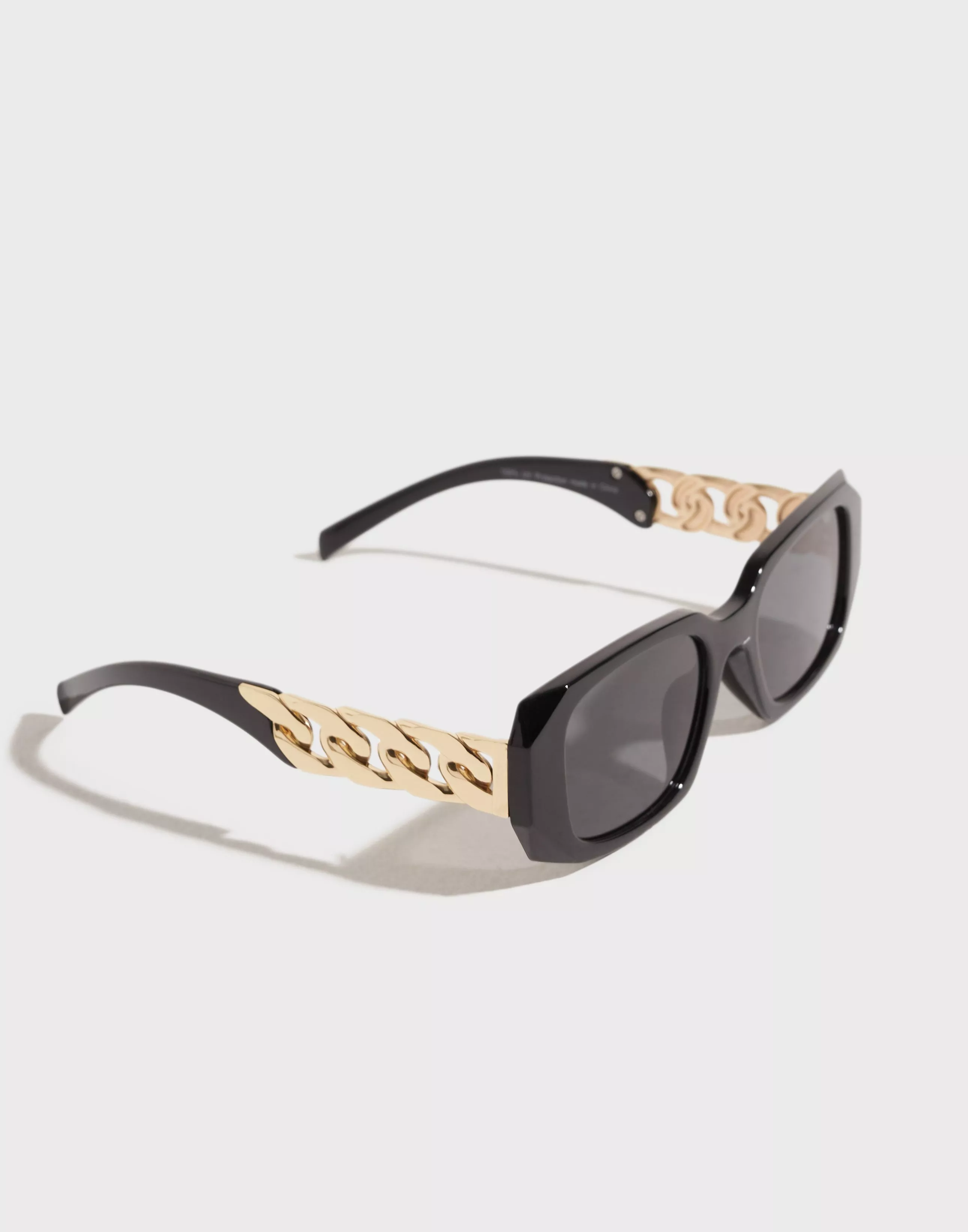 Black sunglasses with gold chain sides on sale