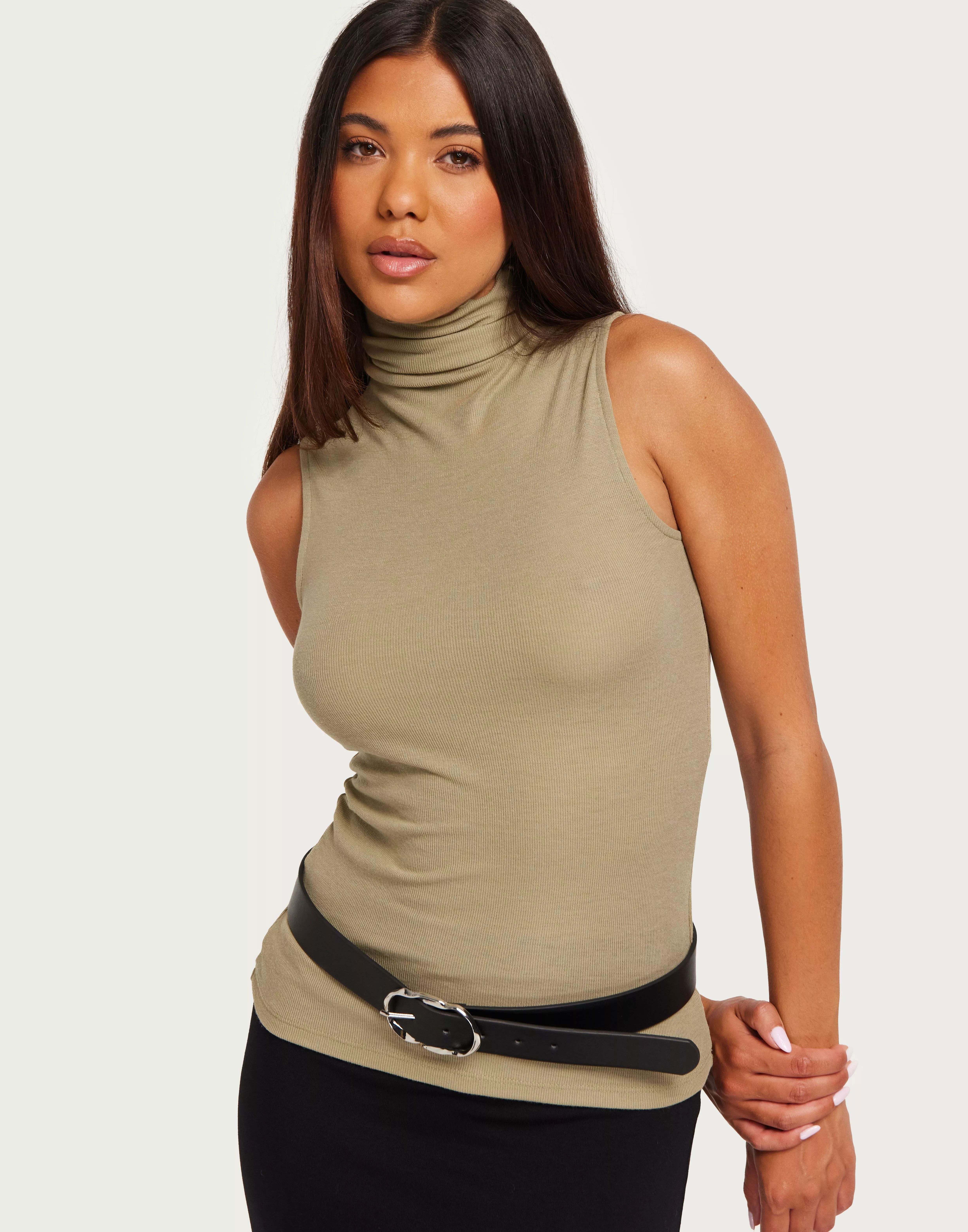 Ladies sleeveless turtleneck on sale tops