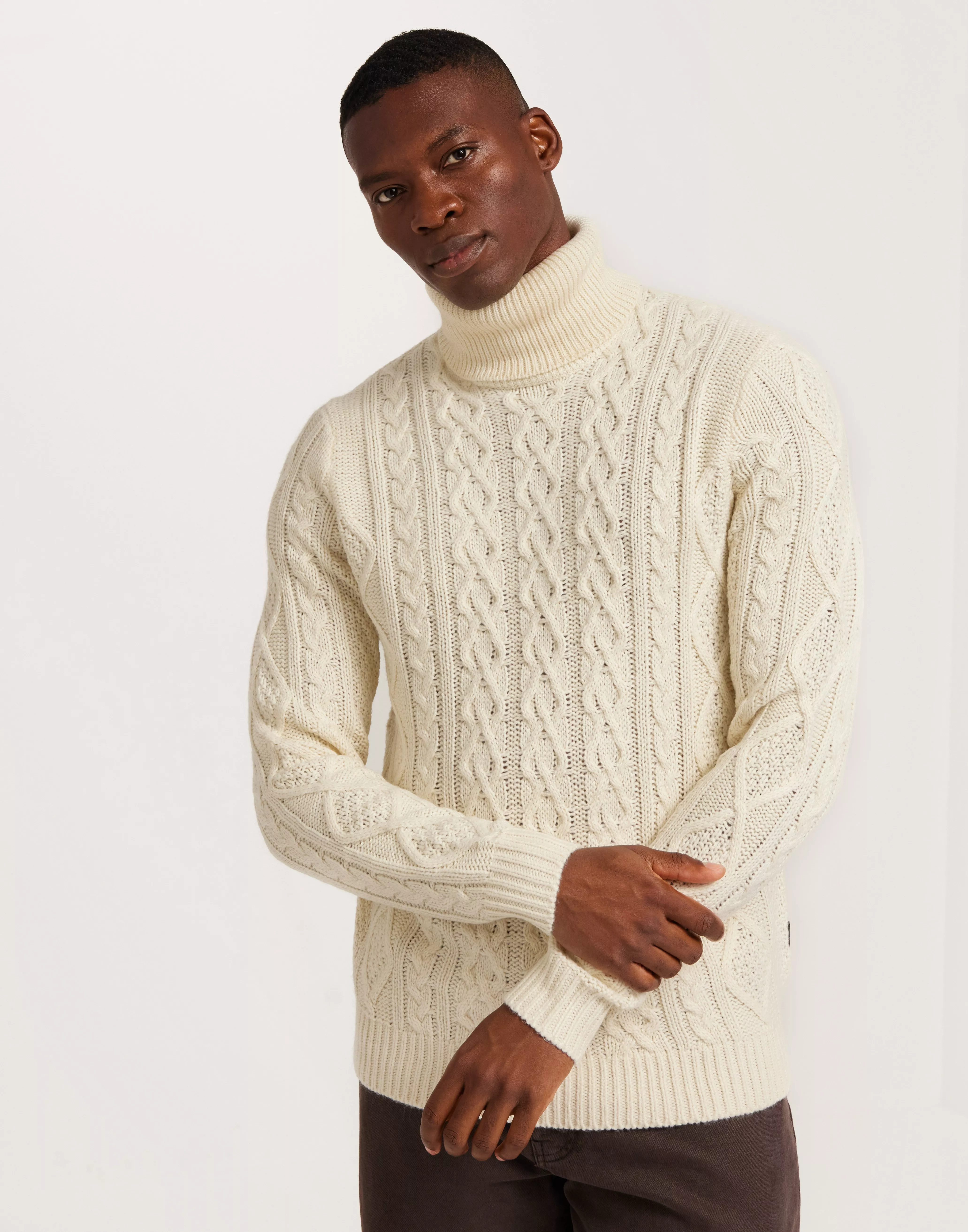 Cable knit roll neck mens sale