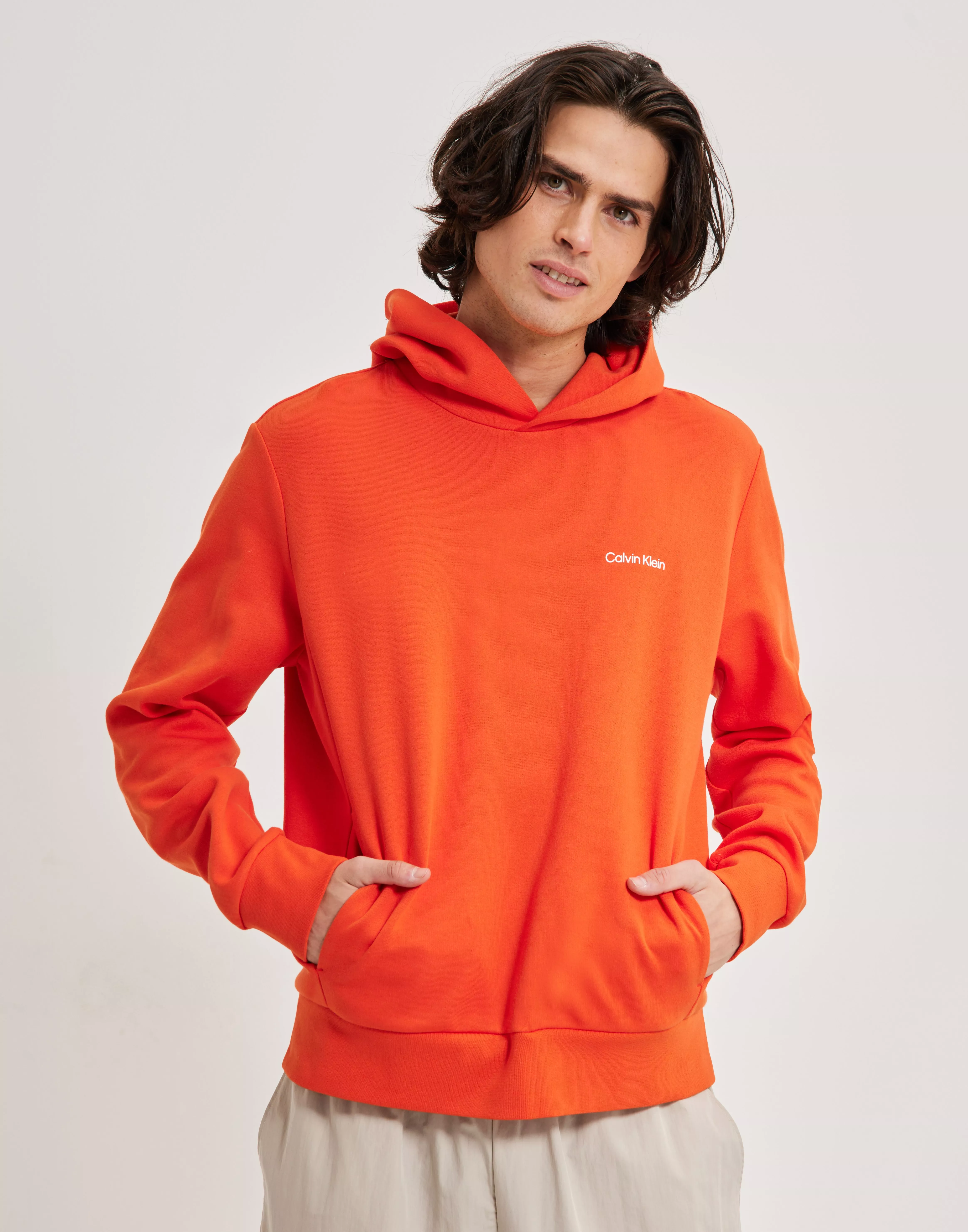 musikkens Trolley efterskrift Køb Calvin Klein MICRO LOGO REPREVE HOODIE - Orange | NLY Man