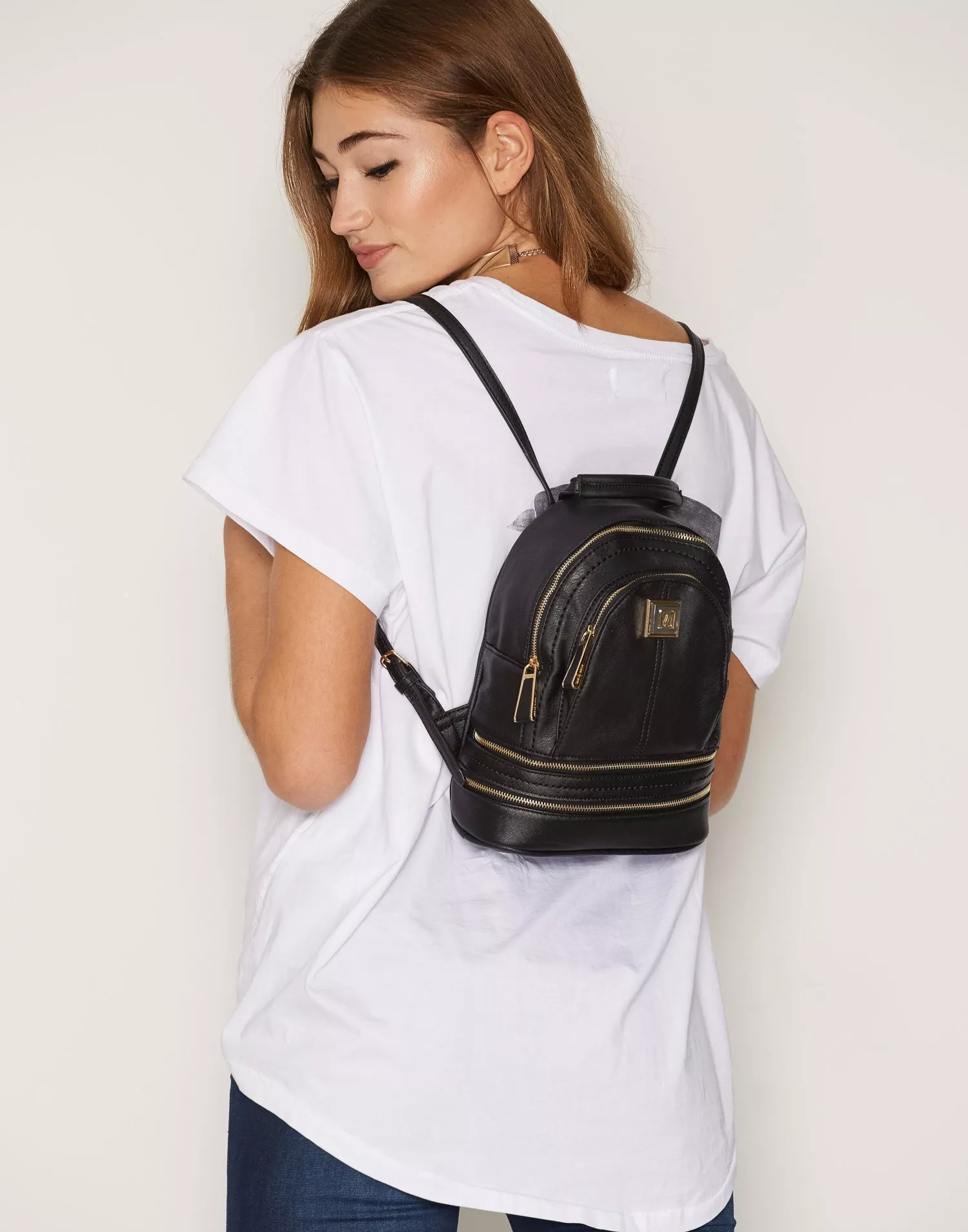 Leather backpack best sale river island