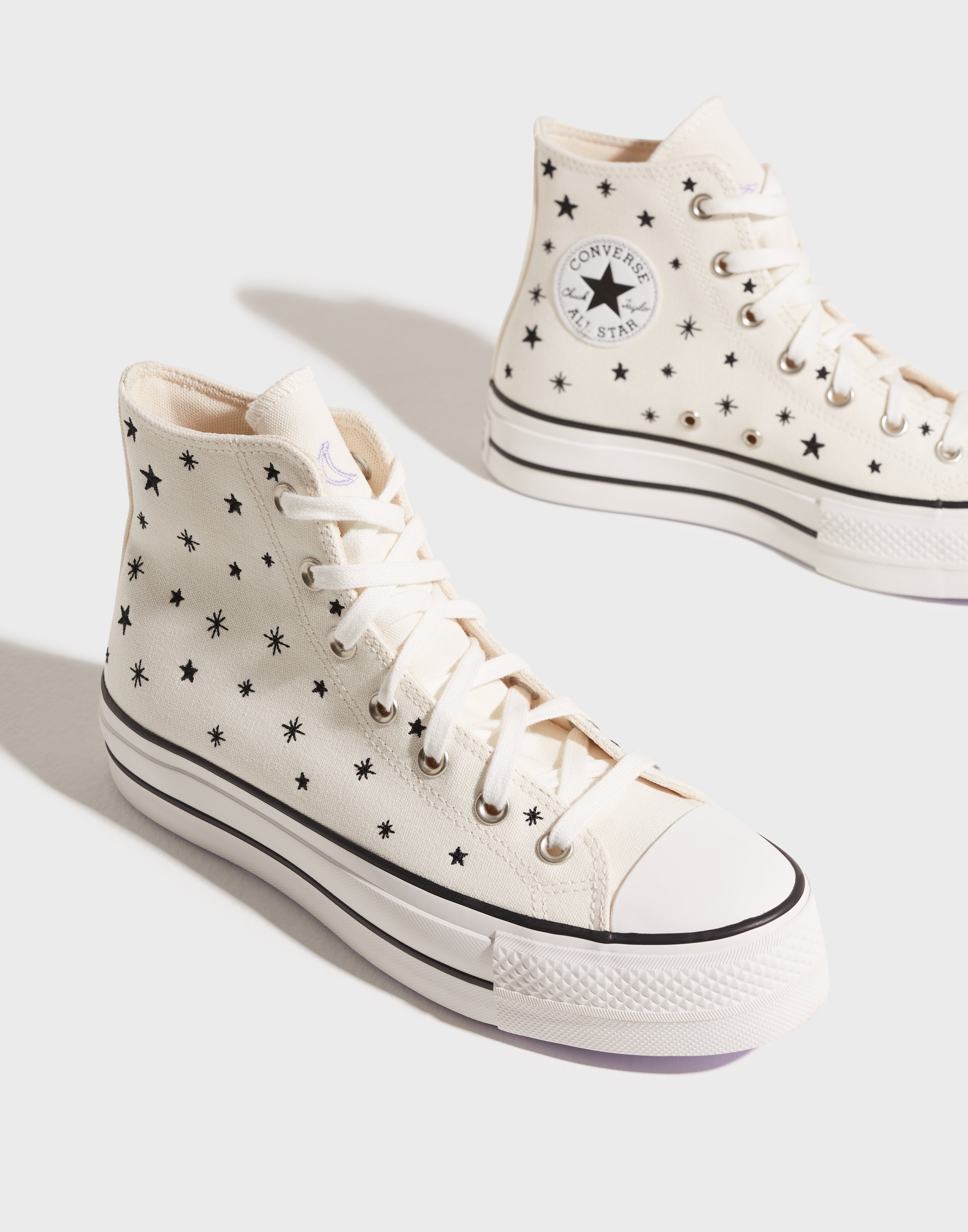 studded high top converse