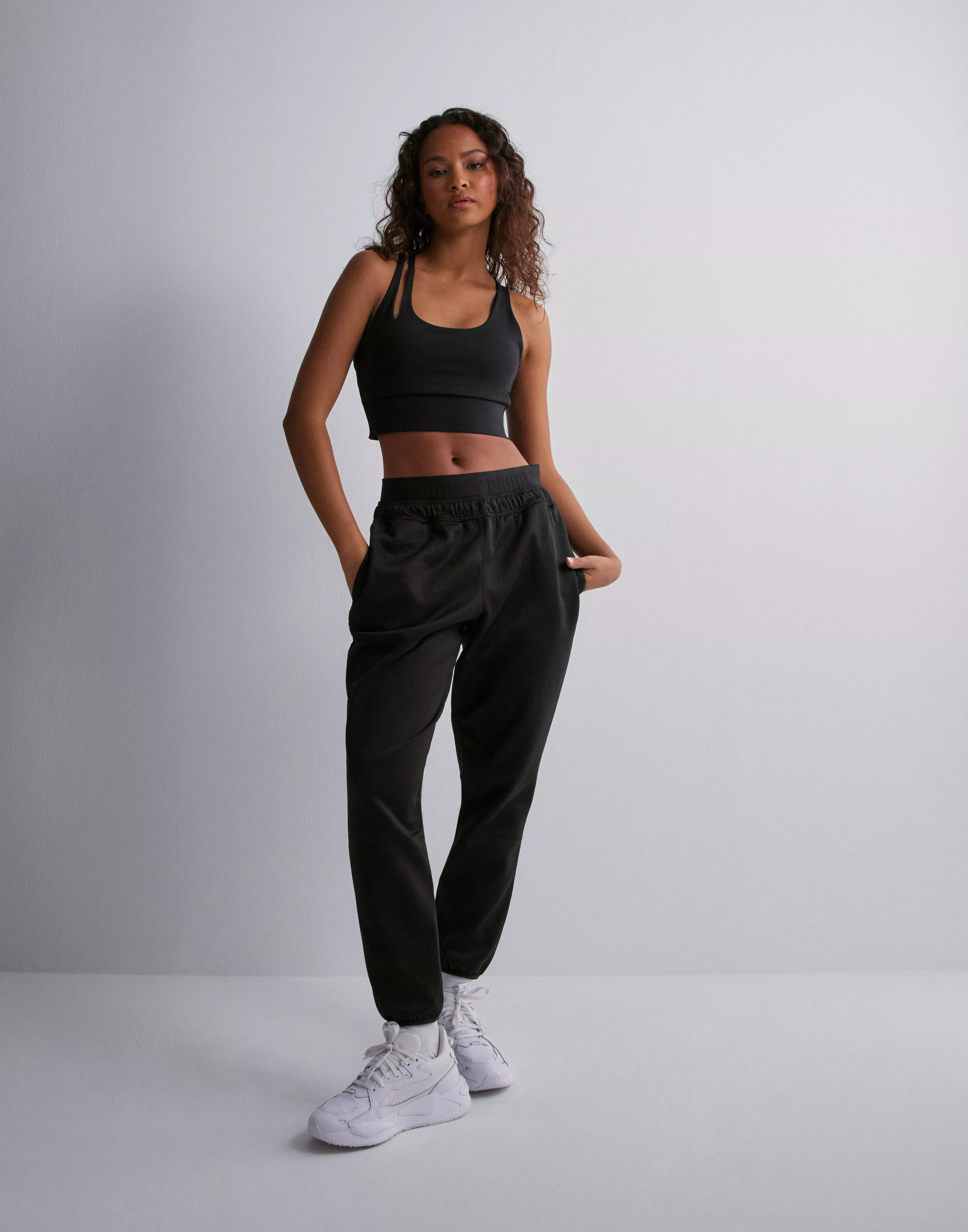 Puma Strong Powerfleece Joggers Womens Black Casual Athletic Bottoms  52387701