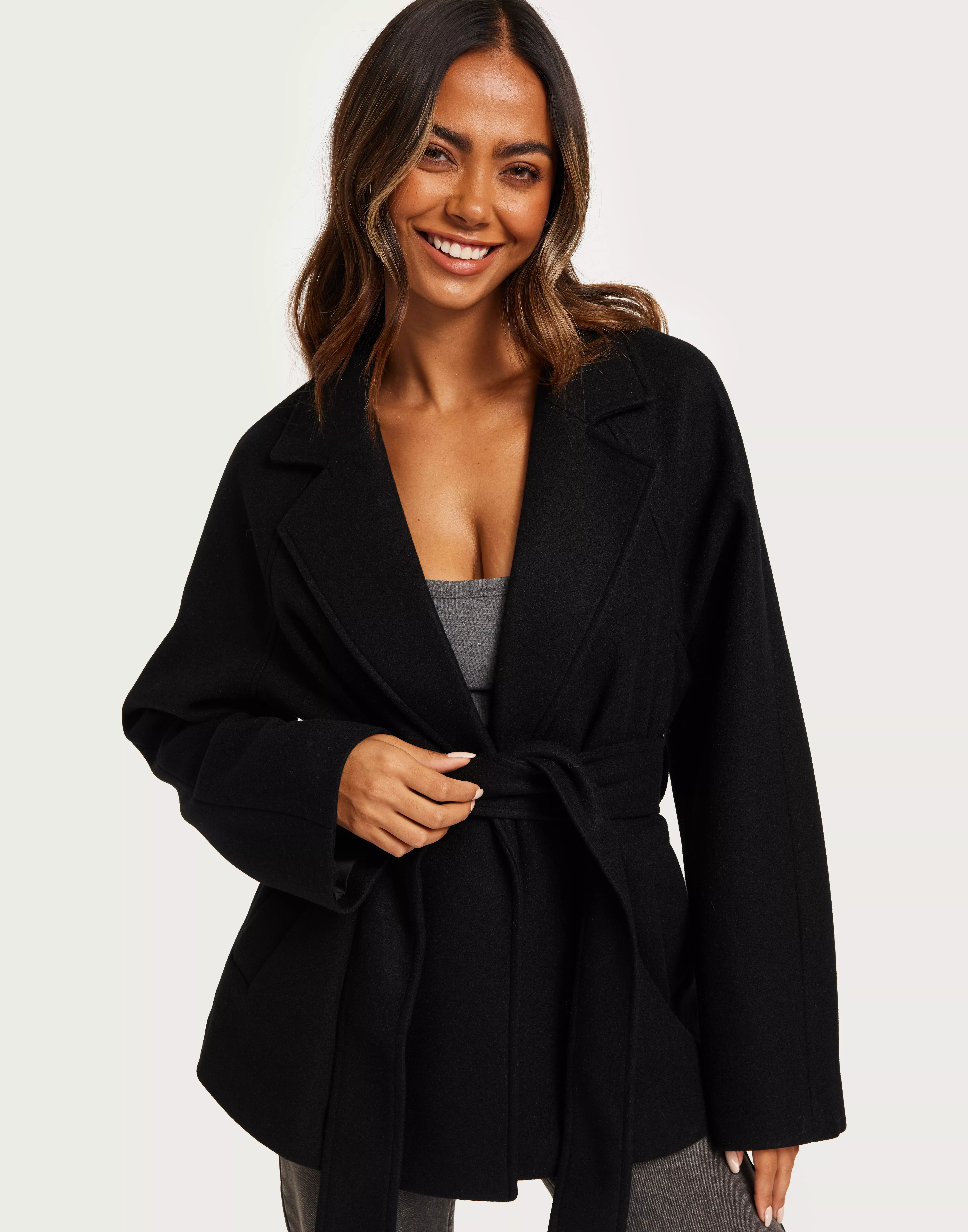 Short black wrap clearance coat