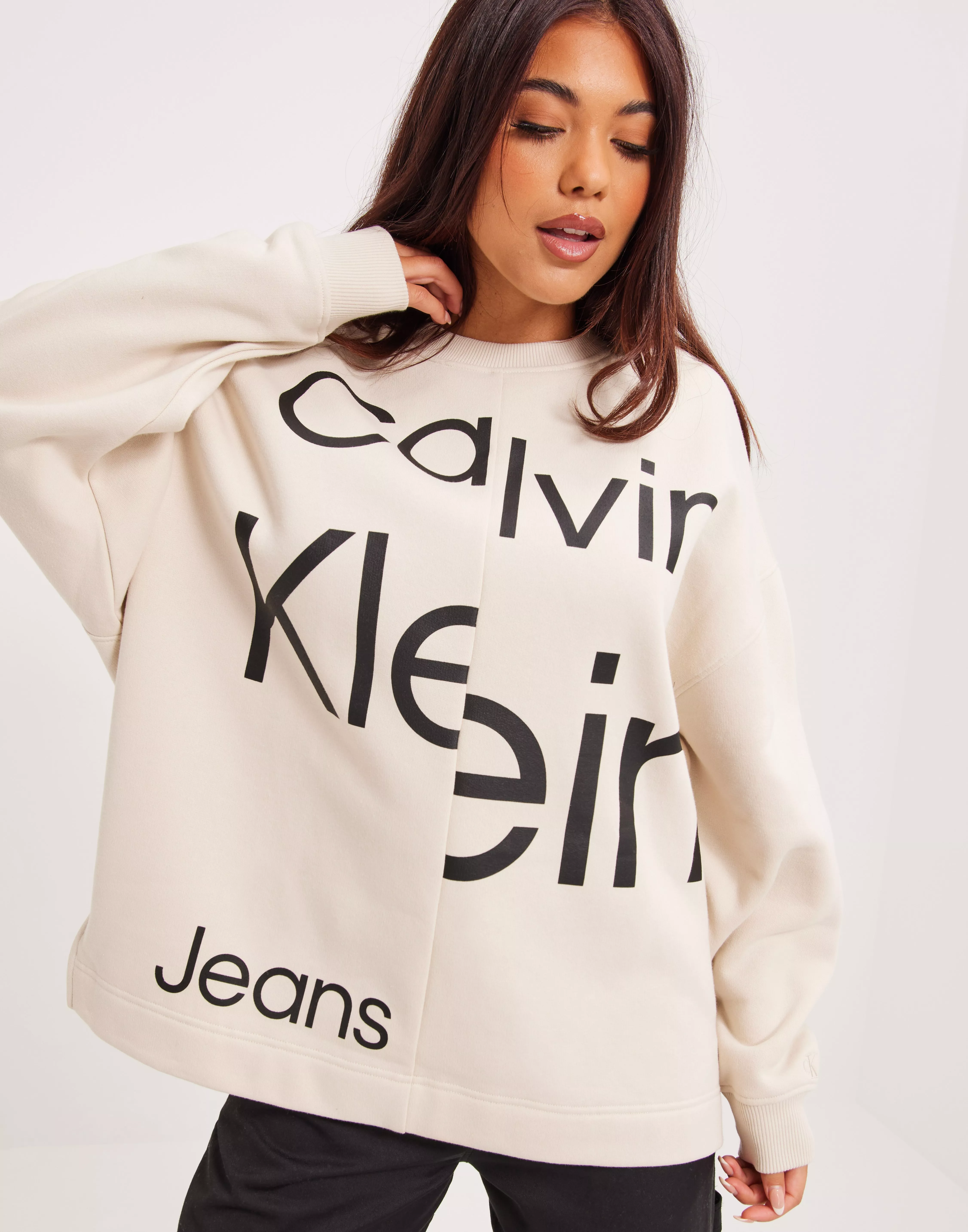 Buy Calvin Eggshell SWEATSHIRT Jeans LOGO - DISRUPTED BOLD Klein