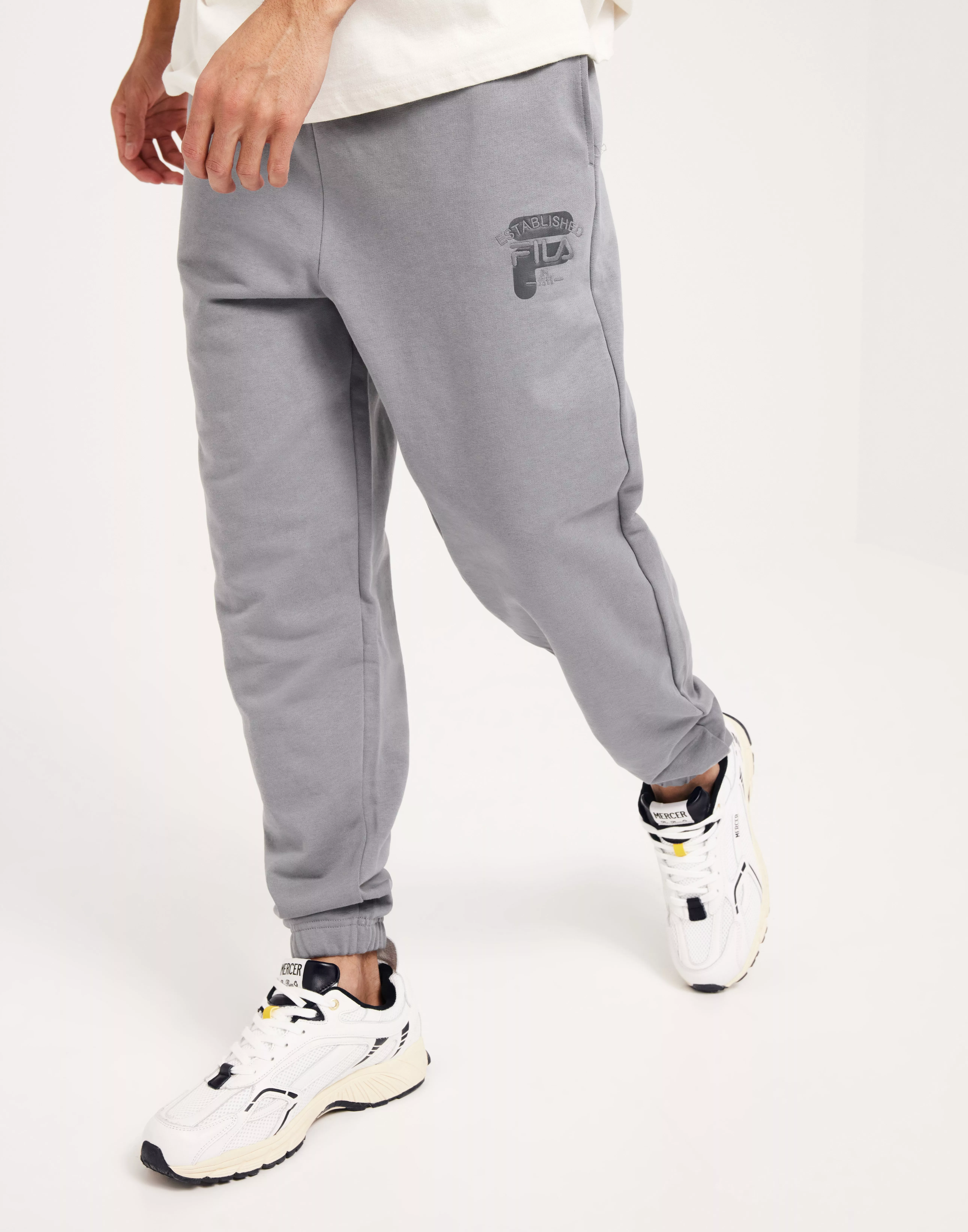 Buy Fila BADRA relaxed sweat pants Night Owl NLYMAN