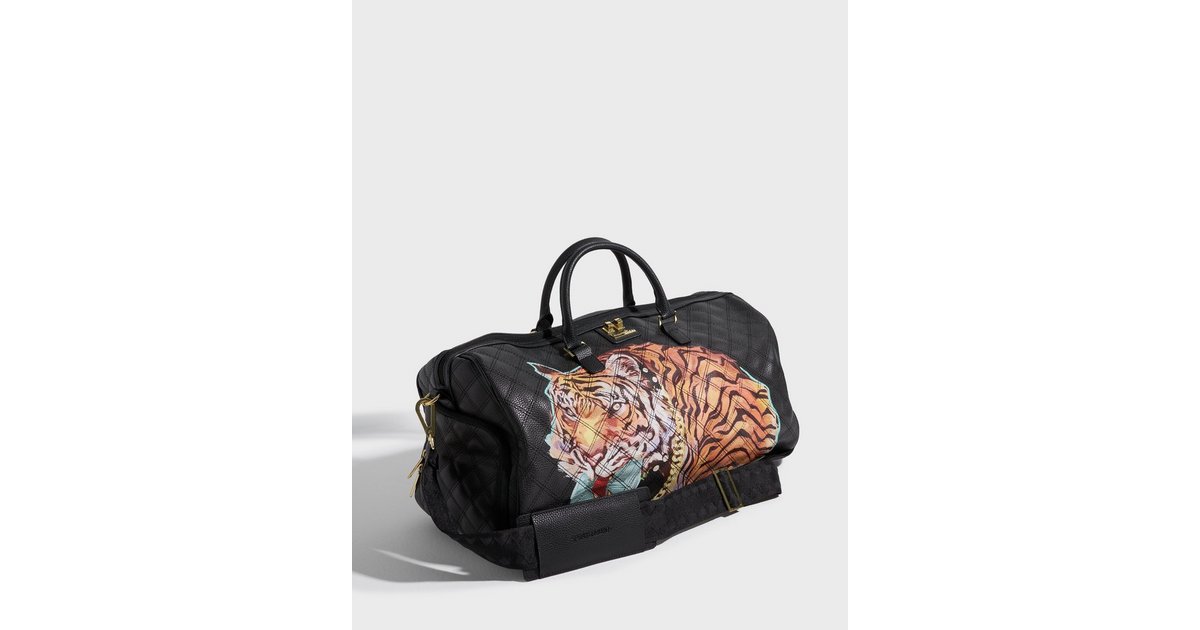 Gucci tiger duffle discount bag