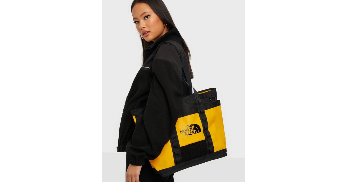 Buy The North Face Explore Utility Tote - Gold | Nelly.com