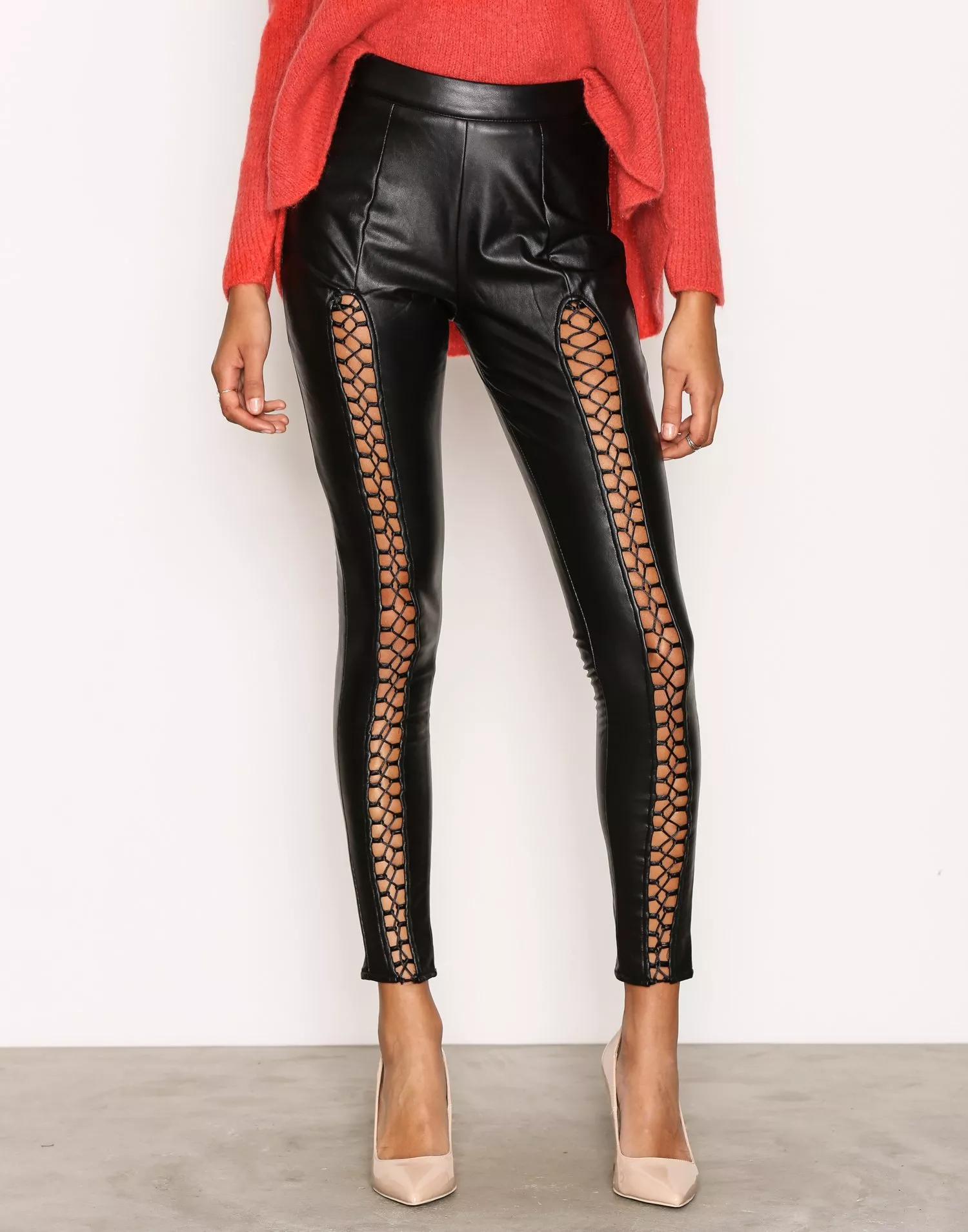 Missguided is selling £40 faux leather trousers with lace-up detailing -  and we're not sure what to make of them