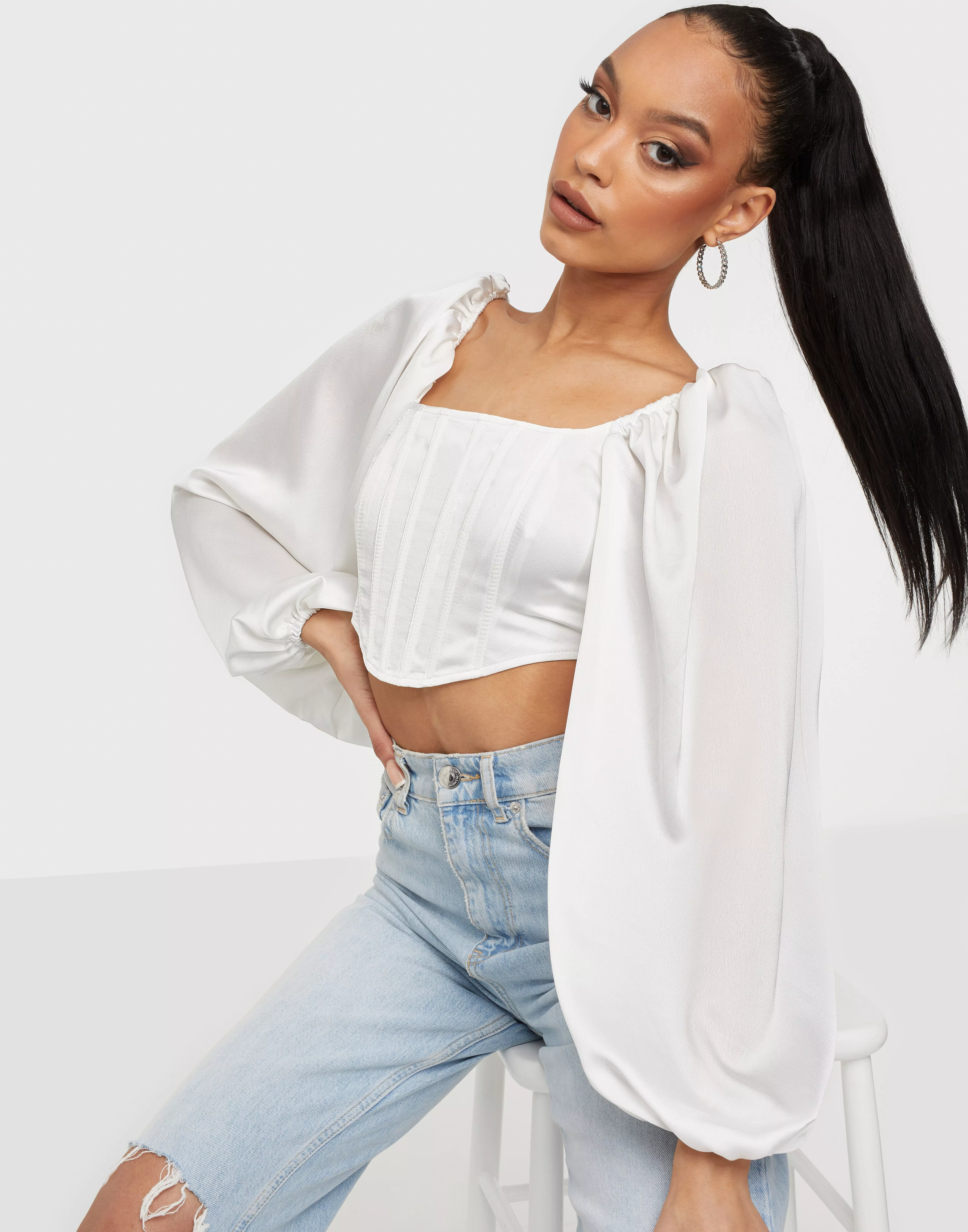 White bustier store top with sleeves