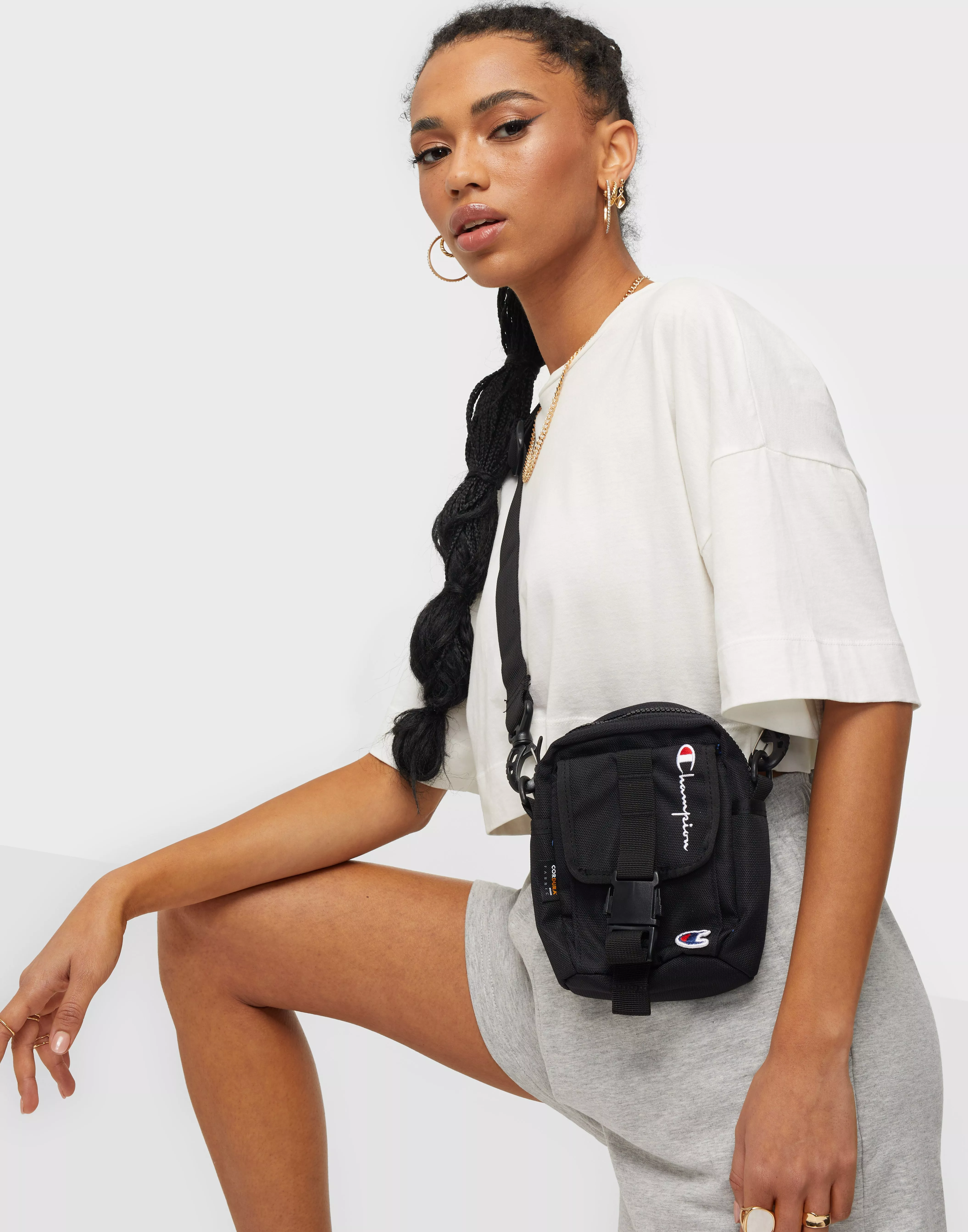 Champion over best sale shoulder bag