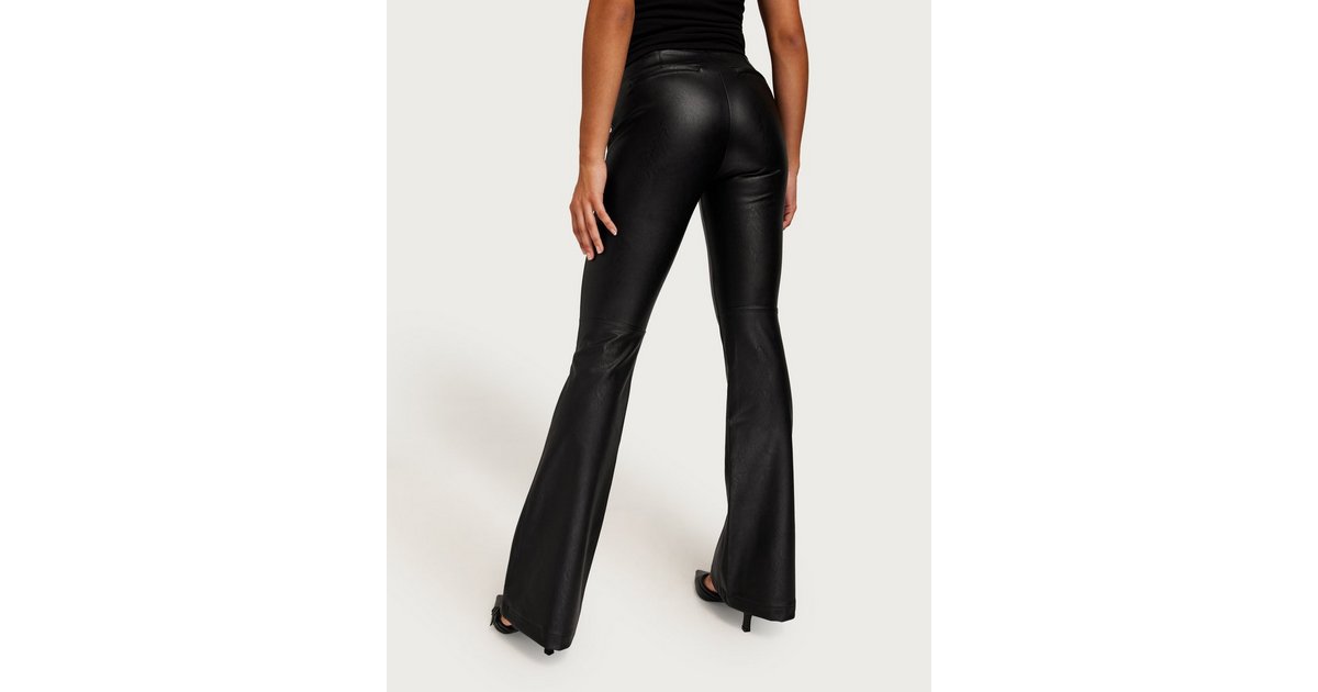 Your booty called. It wants these Leather-Like Flare Pants. Tap link in bio  to shop now 🍑 #Spanx