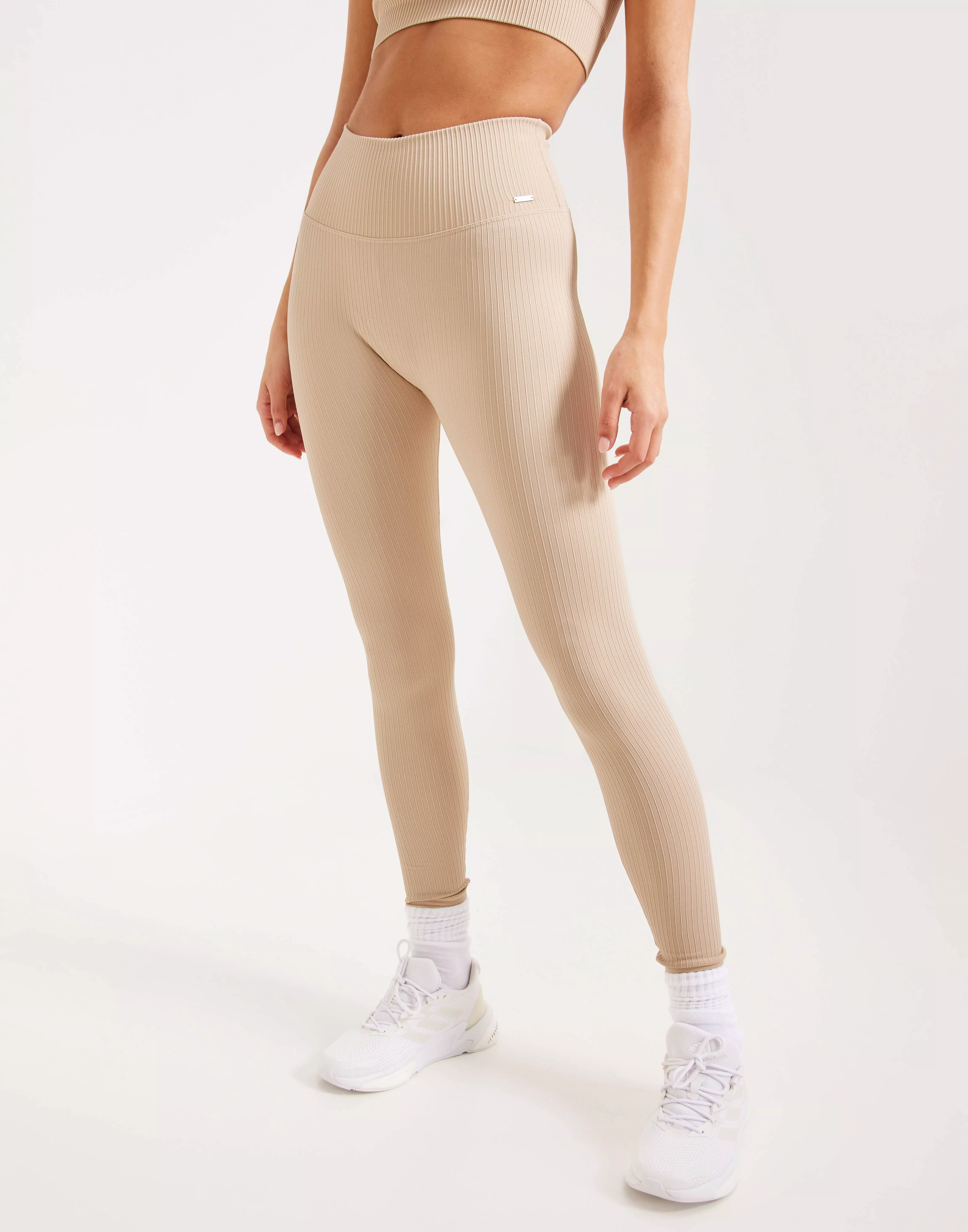 BEIGE RIBBED SEAMLESS FLARE TIGHTS – AIM'N AU