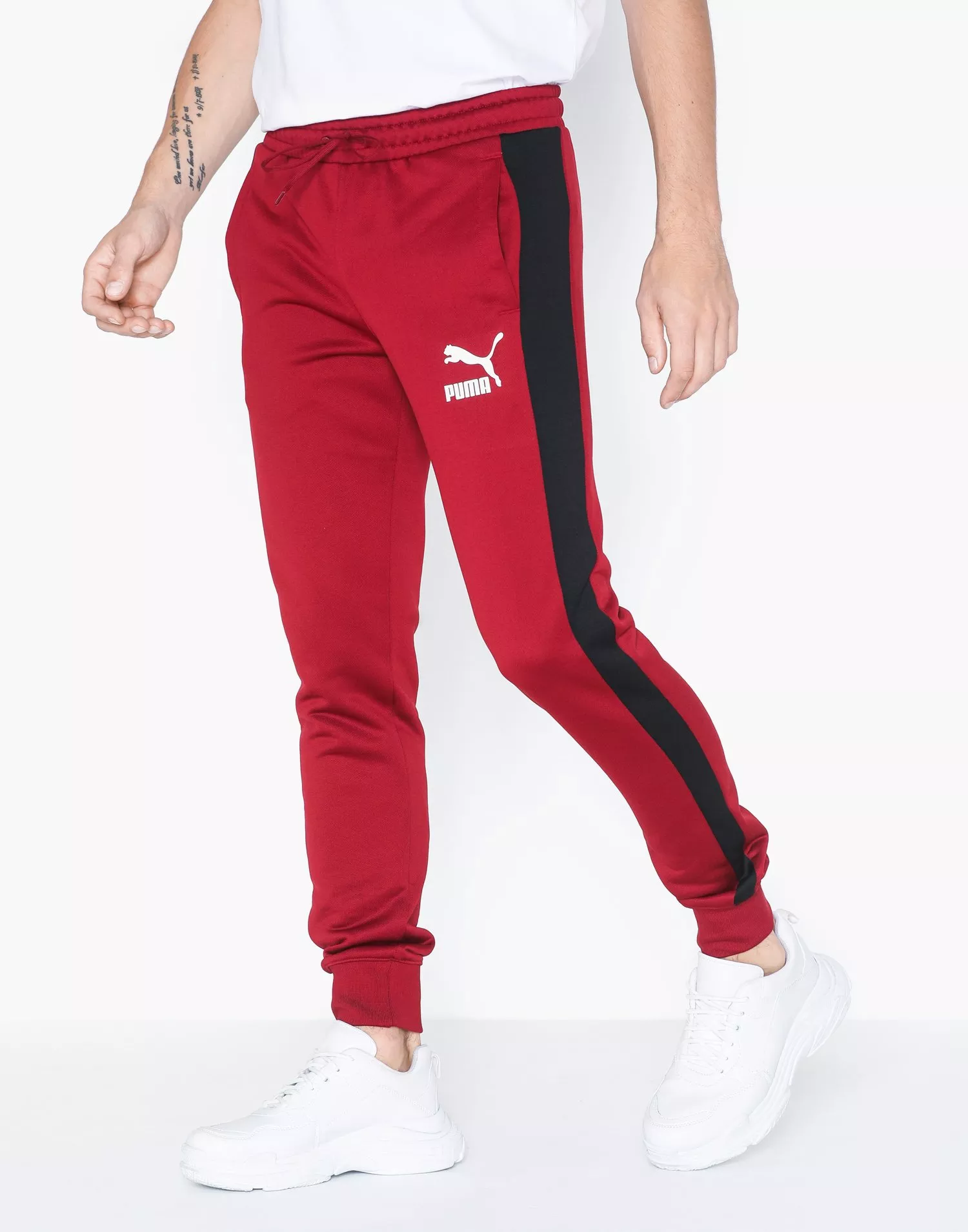 Puma track pants on sale red