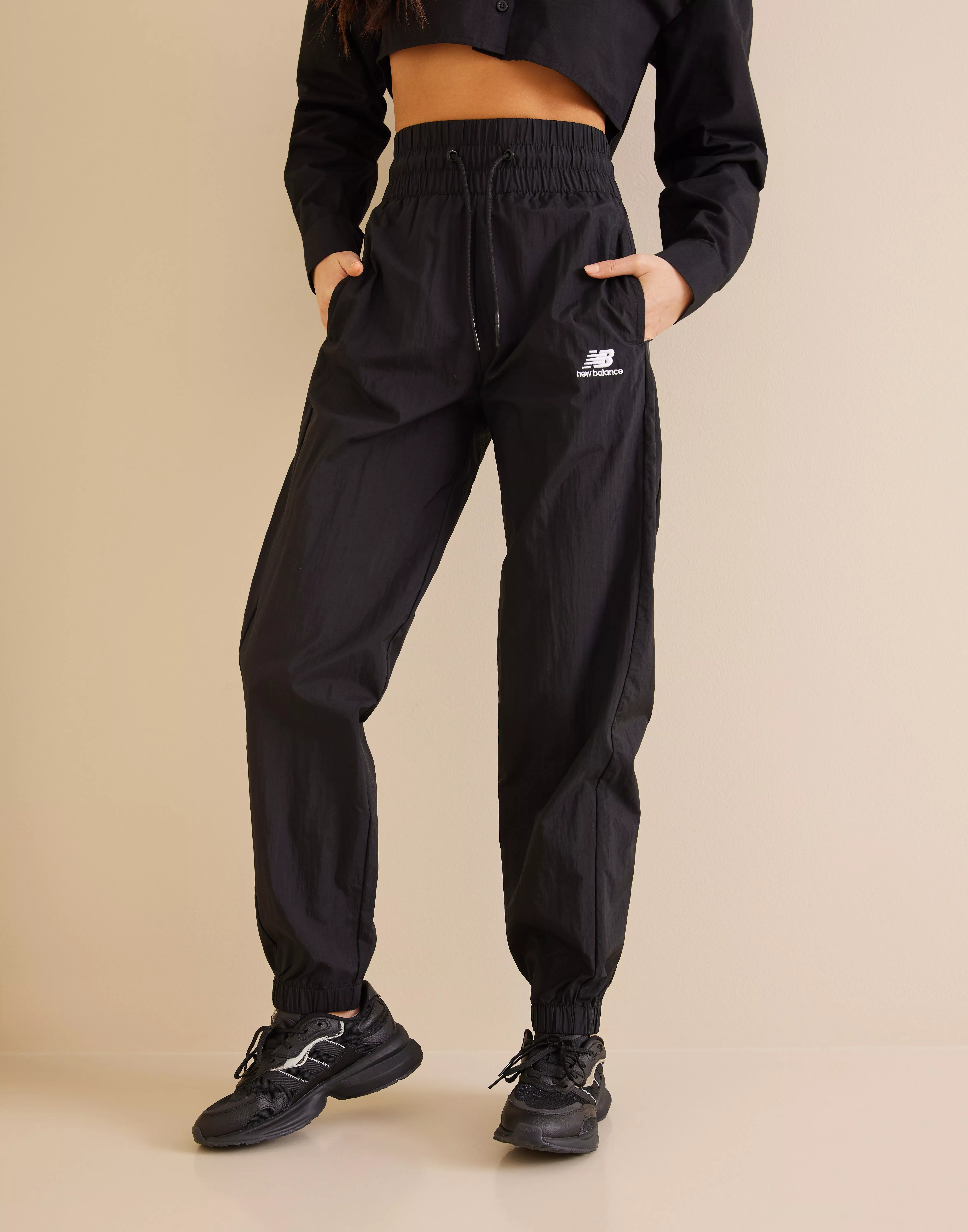 New Balance NYLON PANTS Black