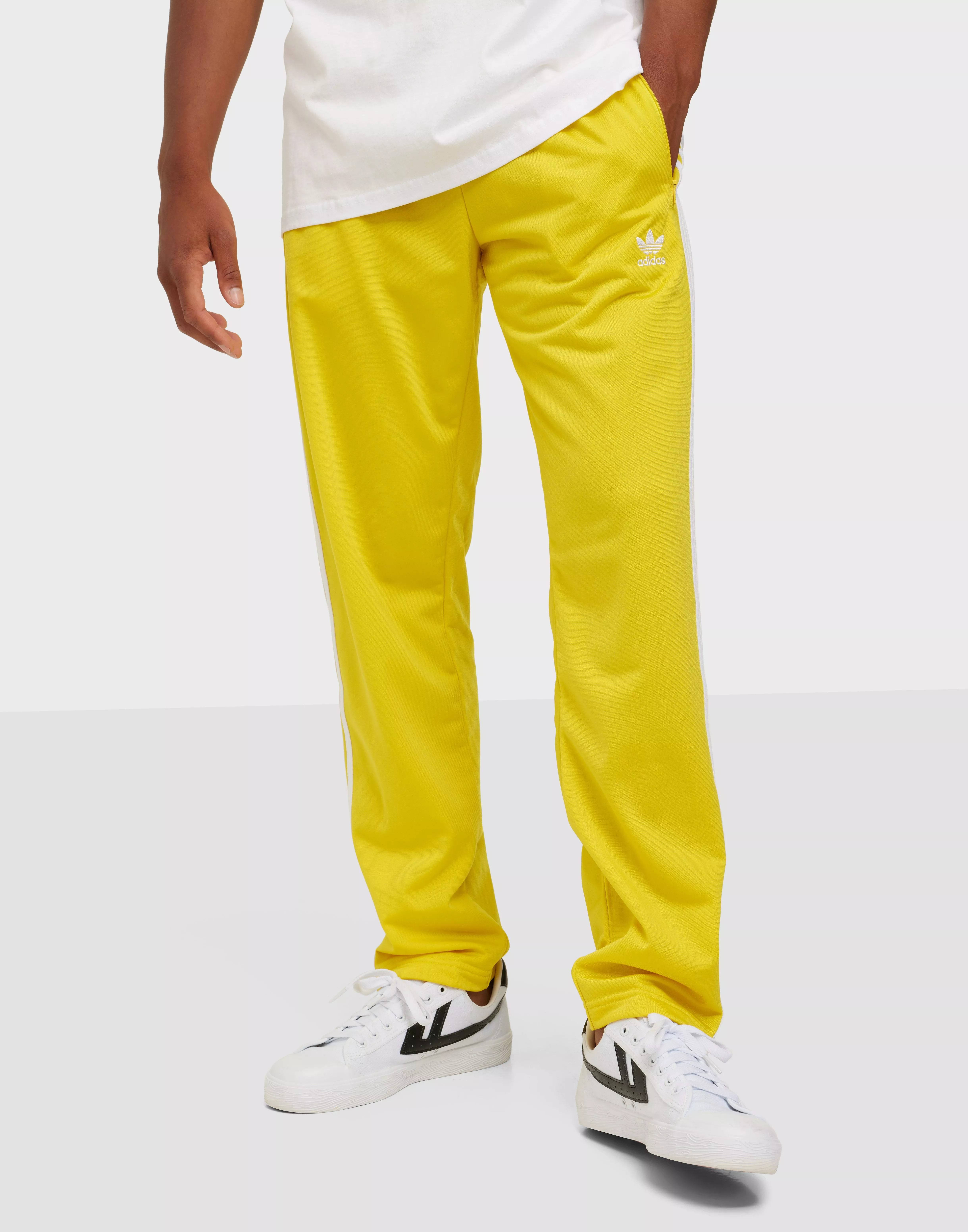 Yellow track pants on sale adidas